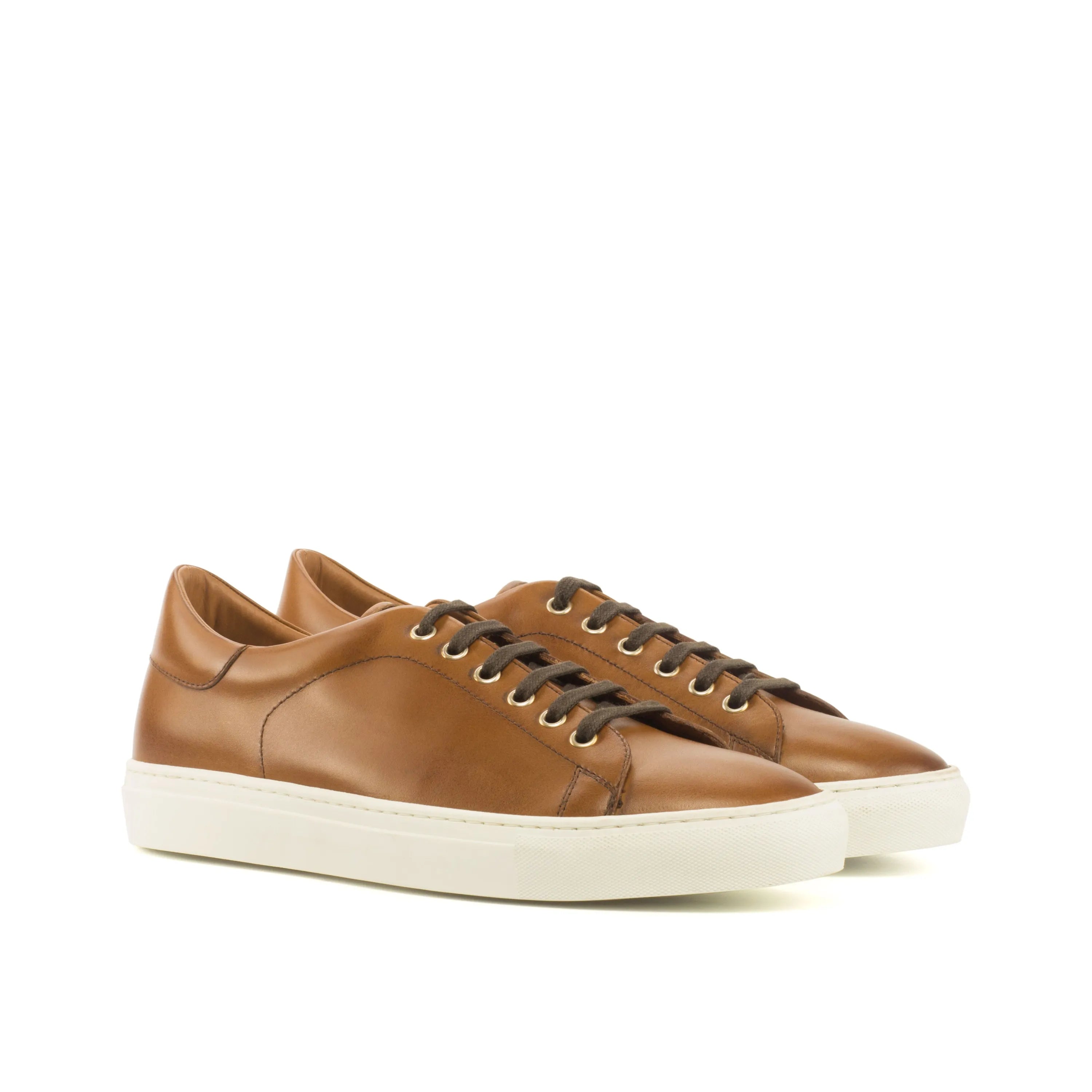 Pair of brown leather Jero Trainer Sneakers II displayed for stylish athletic footwear