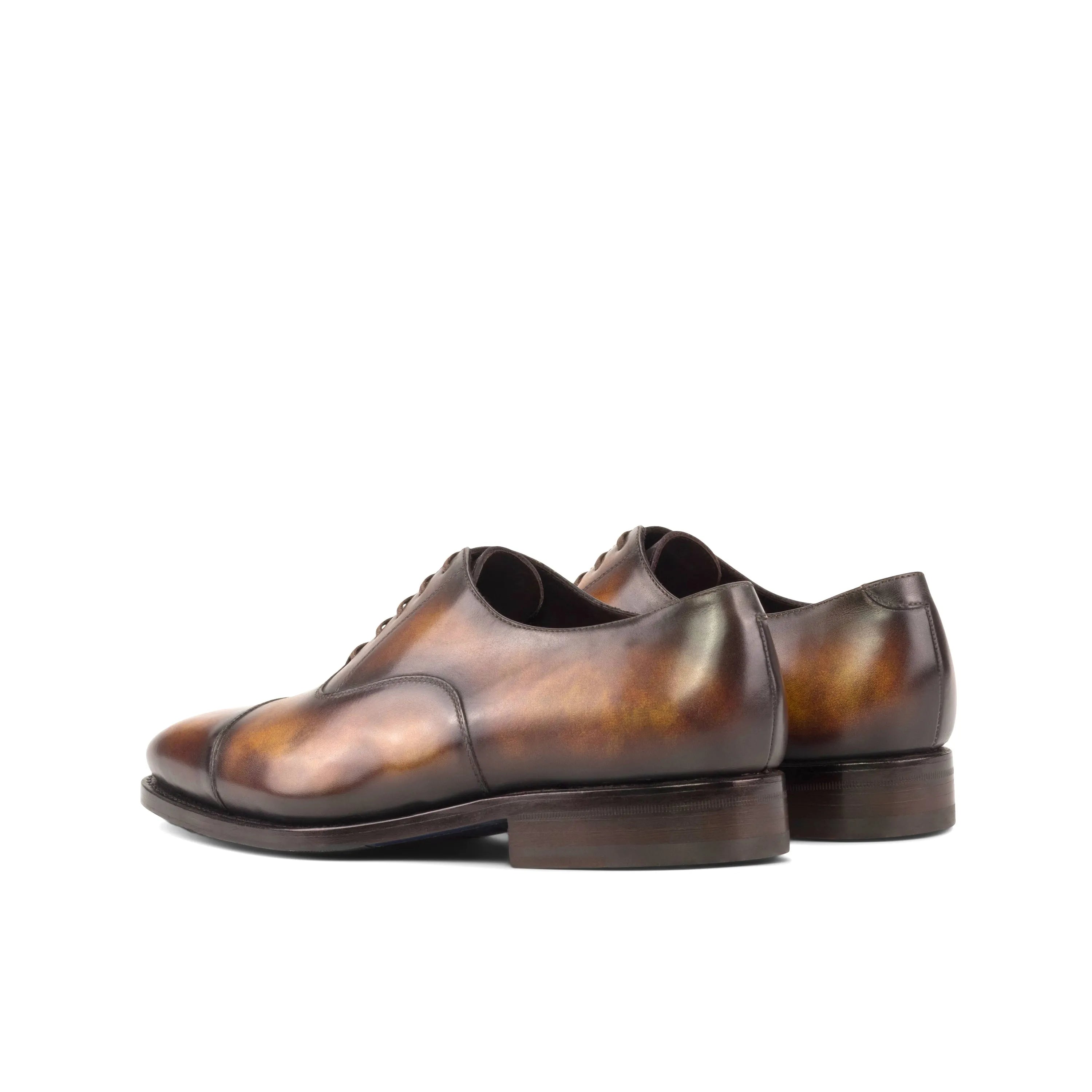 Brown leather Jiniva Patina Oxford shoes showcasing elegant craftsmanship and style