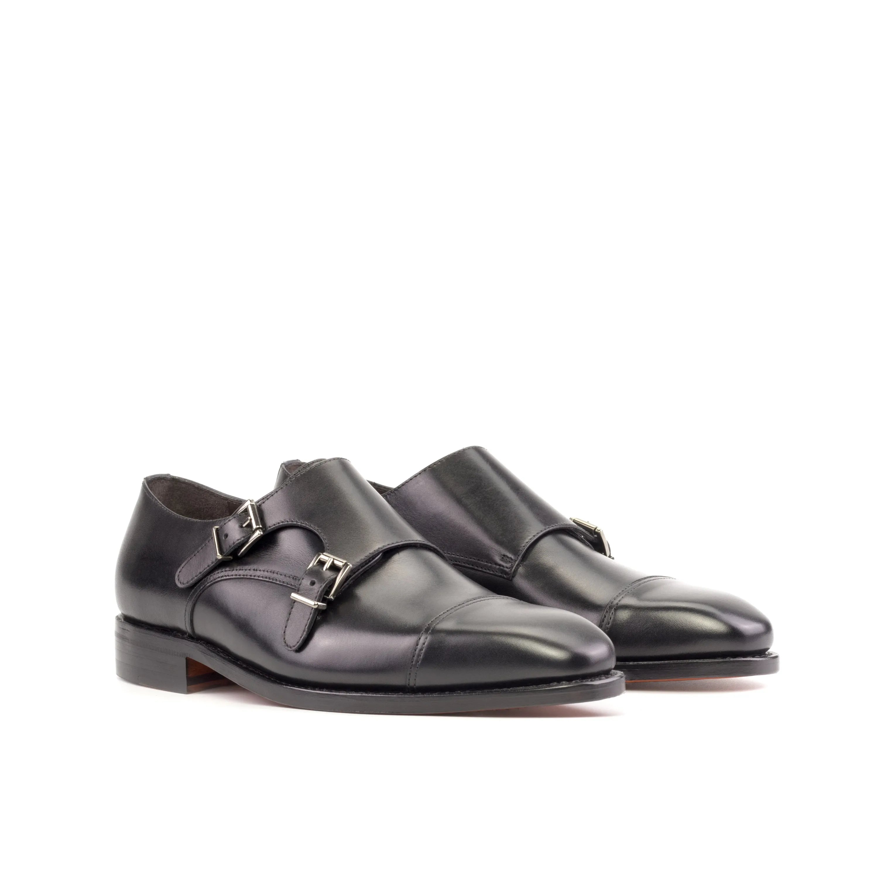 Pair of black leather Jking Double Monk shoes for a stylish fast lane look