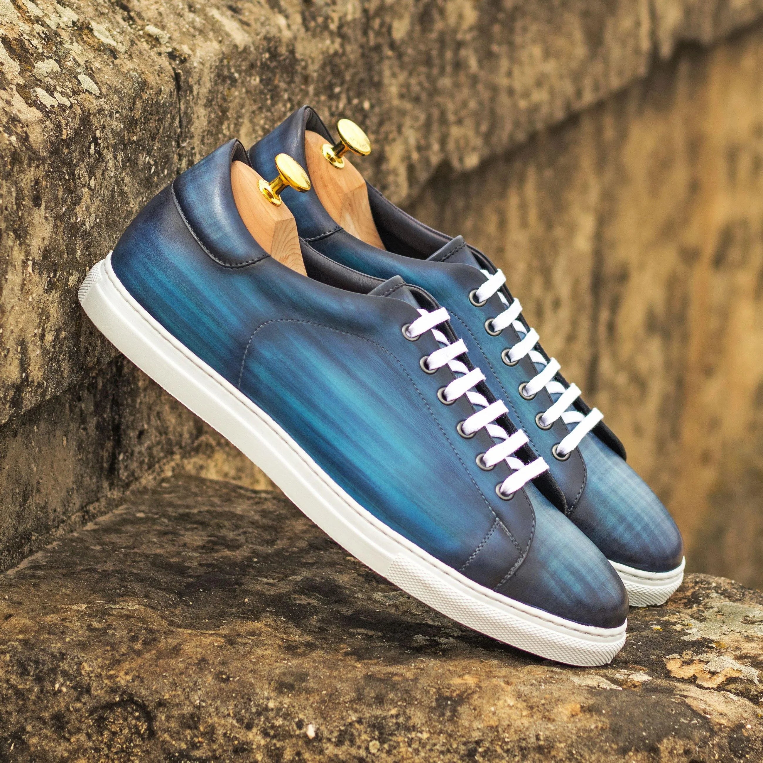 Blue leather Jorar Trainer Patina Sneaker on a stylish background, featuring cupsole design