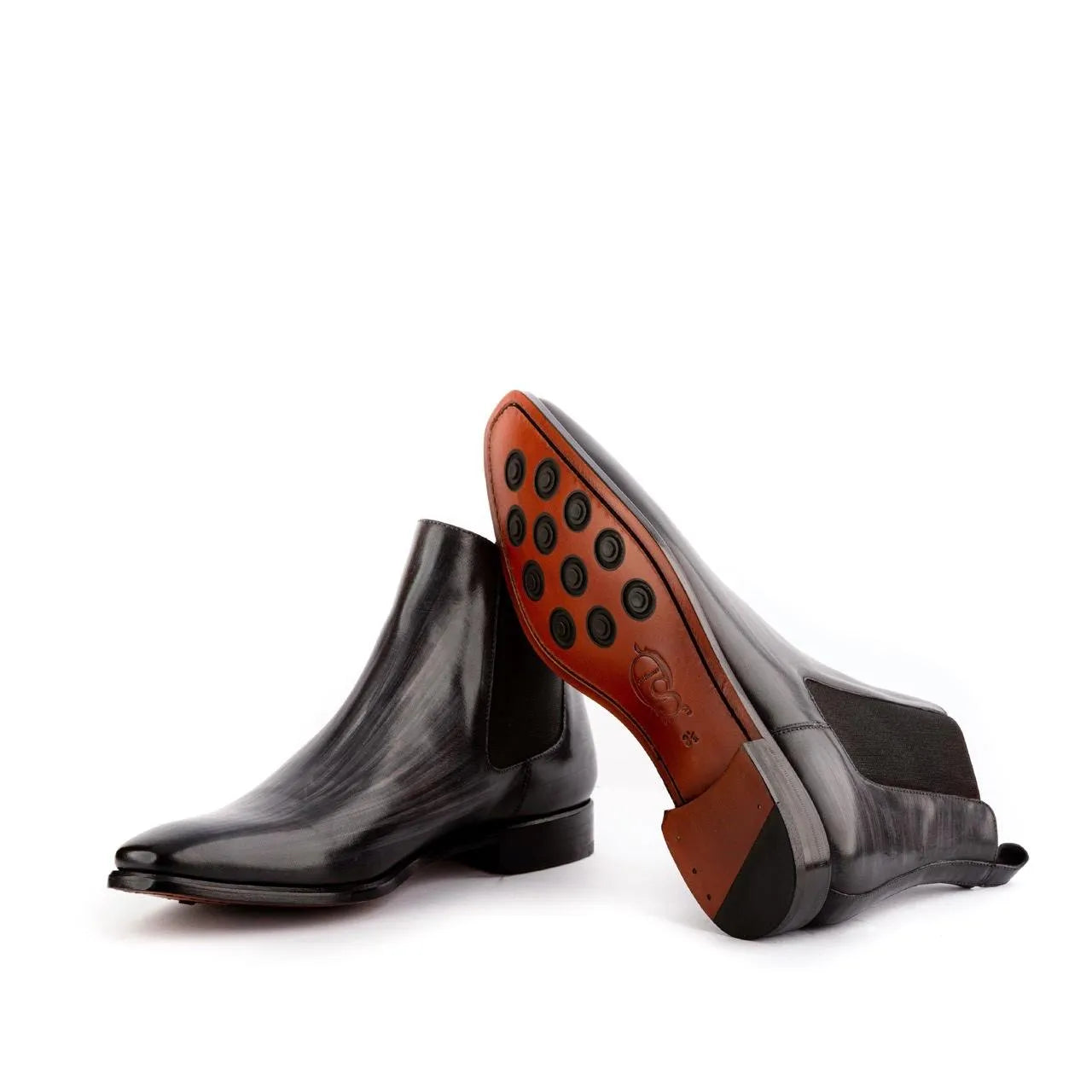 Pair of gray leather Chelsea Patina Boots II showcasing stylish Chelsea patina design