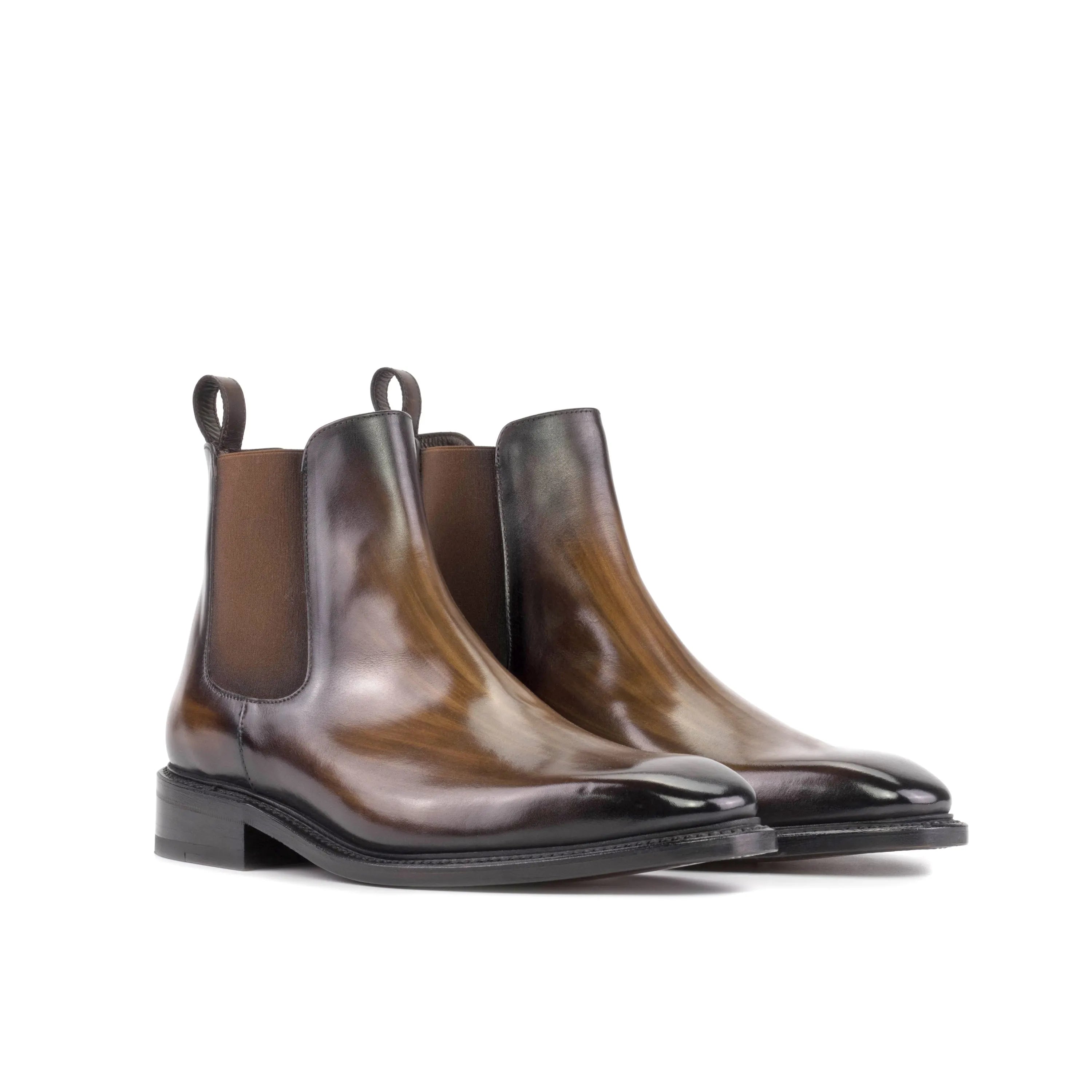 Brown leather Kennedy Patina Chelsea boots with a sleek, stylish design