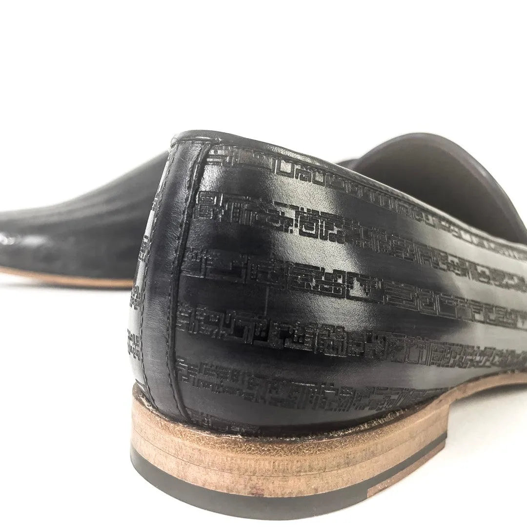 Black leather loafer with geometric pattern in Khalil Patina Wellington Slip-On style