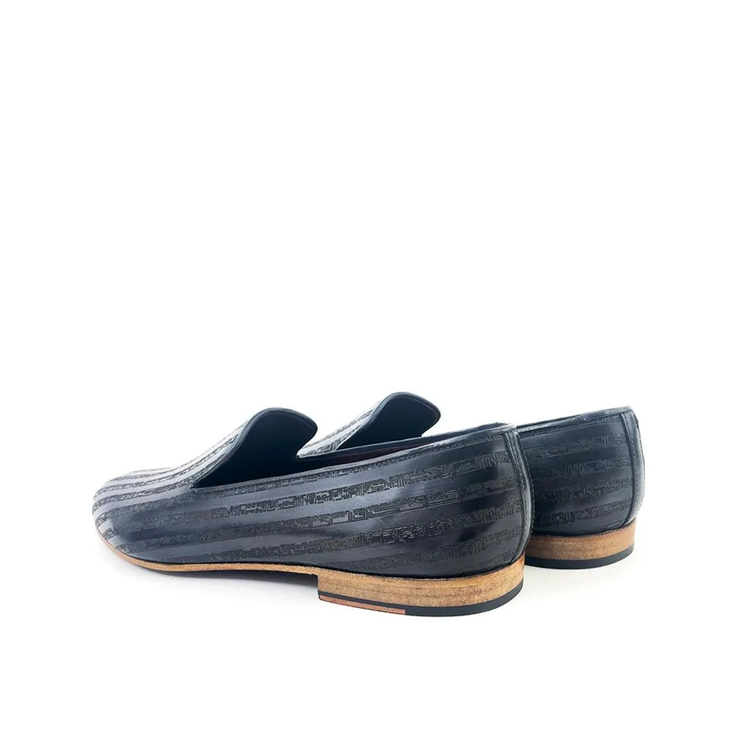 Pair of black leather loafers featuring Khalil Patina Wellington Slip-on design