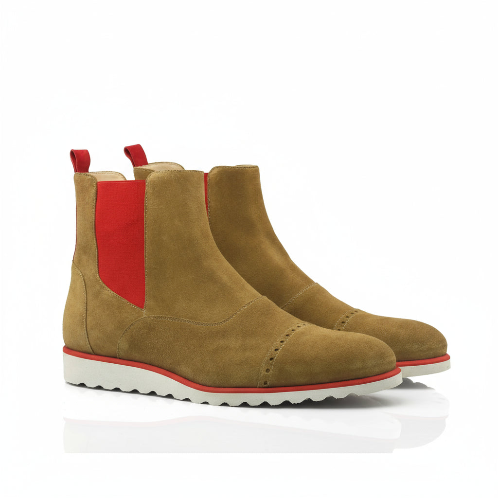 Tan suede Khan Chelsea Boots featuring stylish red accents for a sophisticated look
