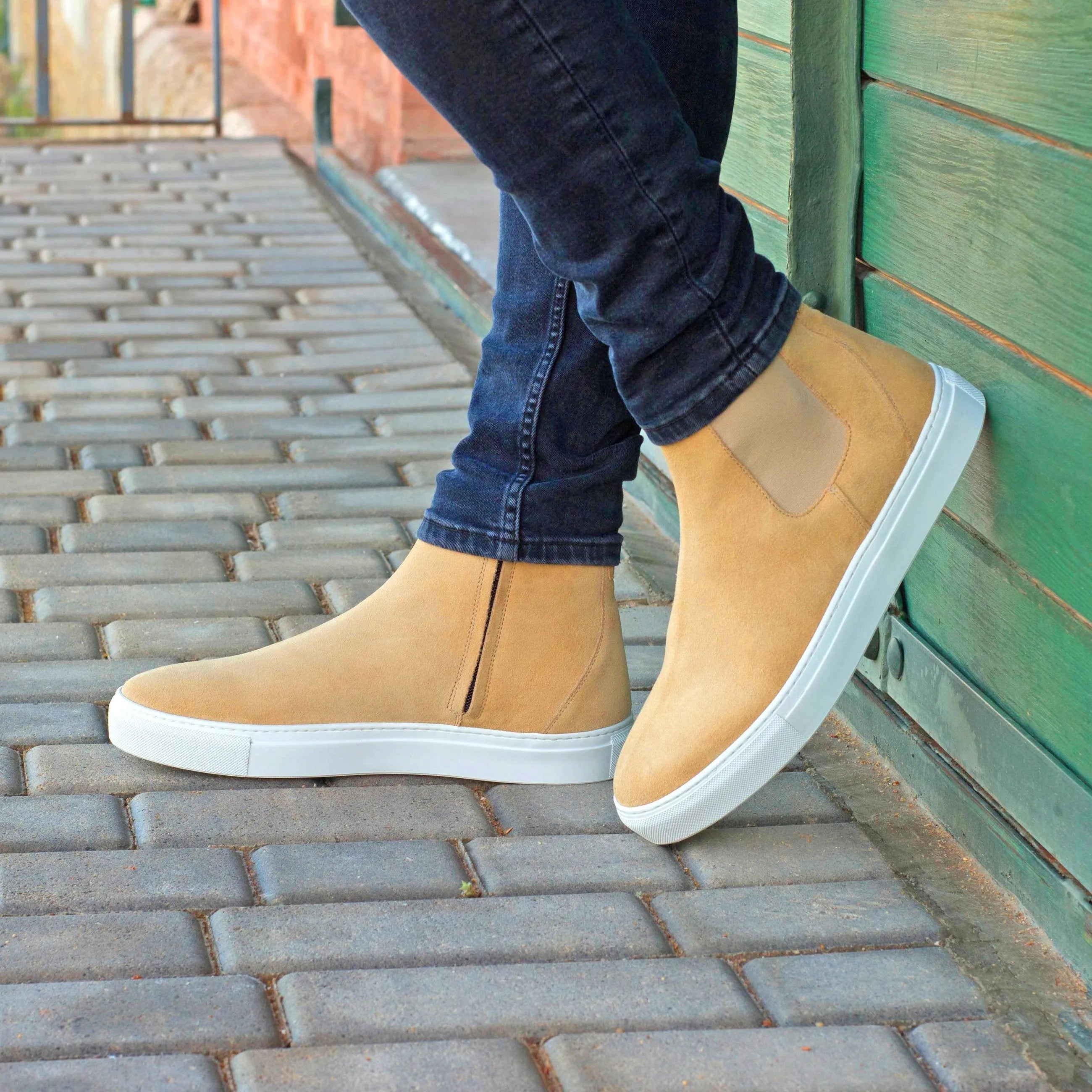 Tan suede KP43 Chelsea sneaker boots showcasing a stylish and versatile design