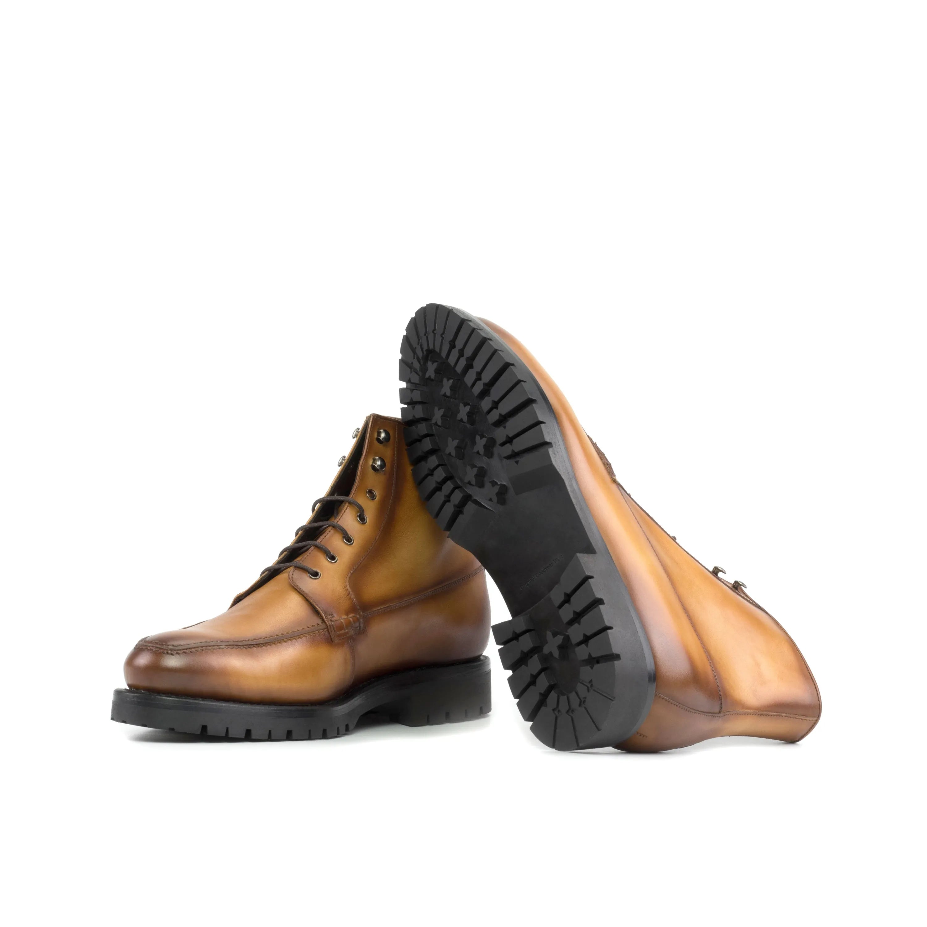 Pair of brown leather lug-soled Landon Moc Boots ideal for stylish comfort and durability