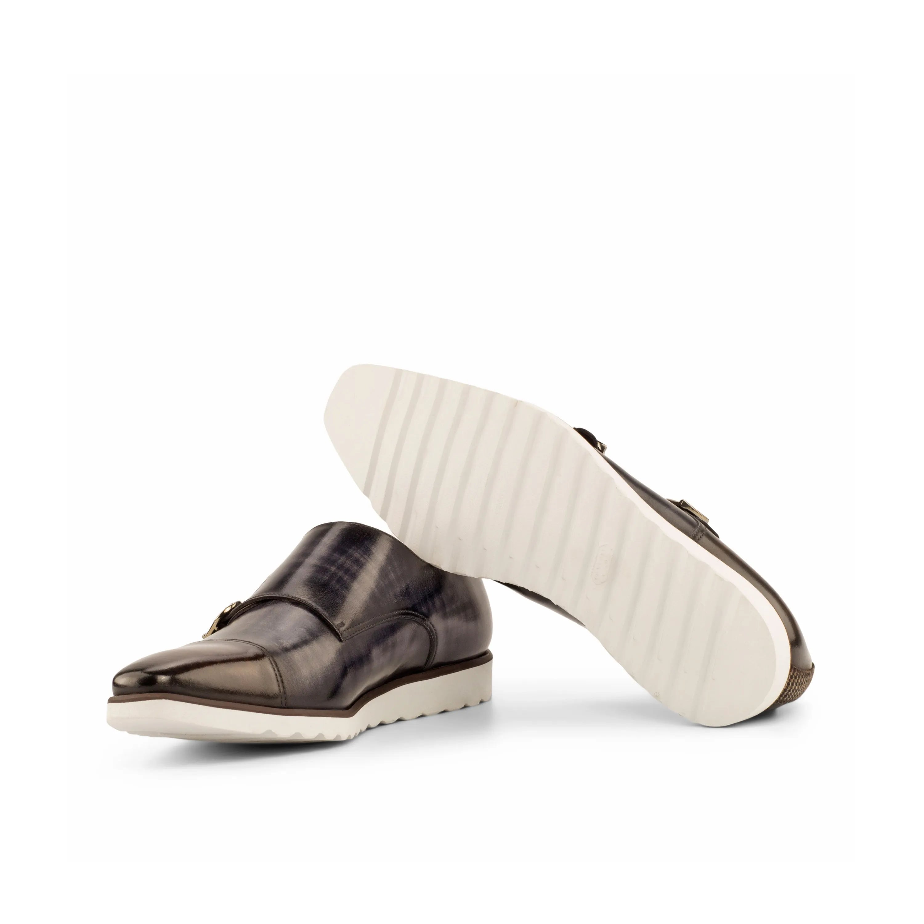 Brown leather Latric Double Monk Patina shoes showcasing elegant style and craftsmanship