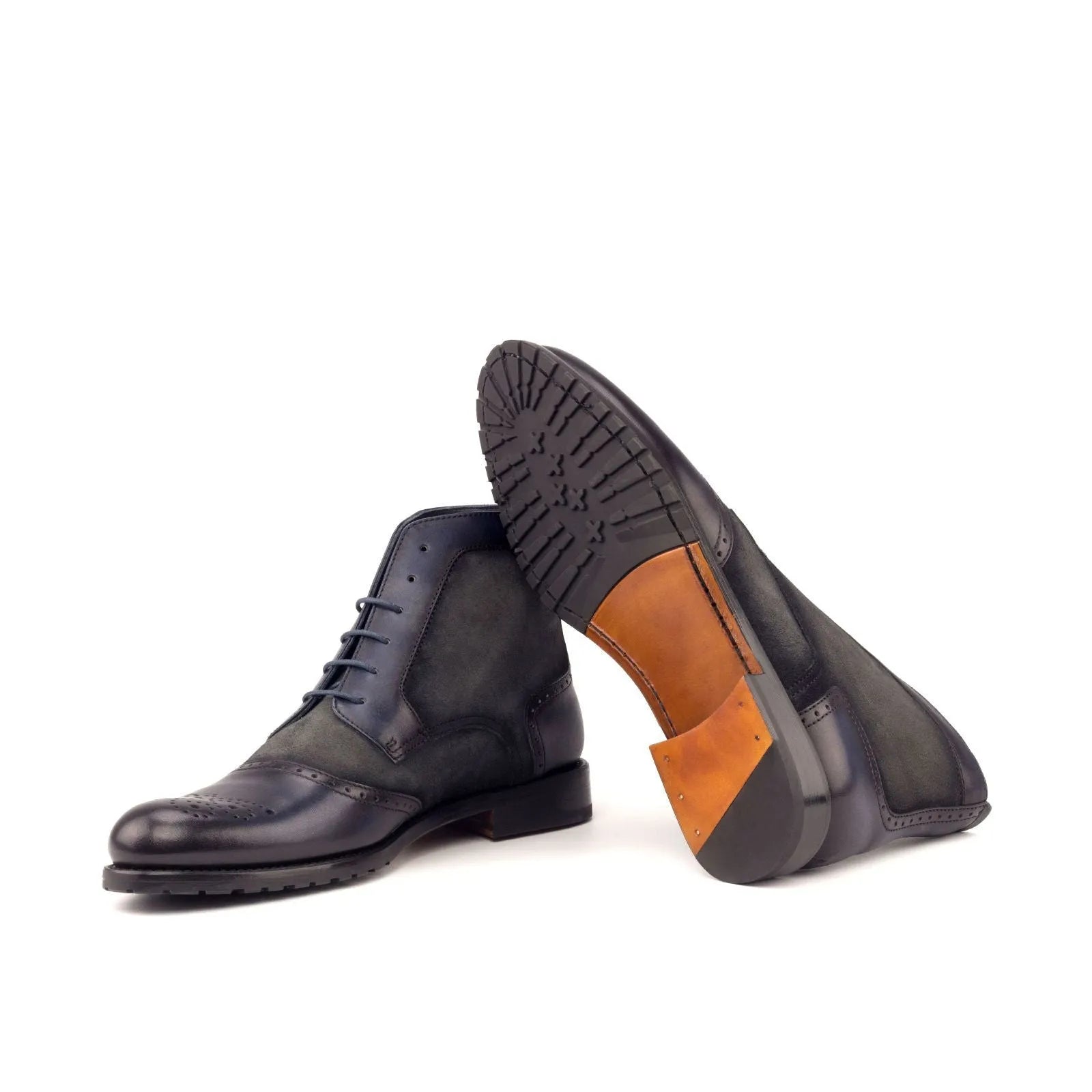 Pair of Lauren Ladies Brogue Boots showcasing stylish leather dress design