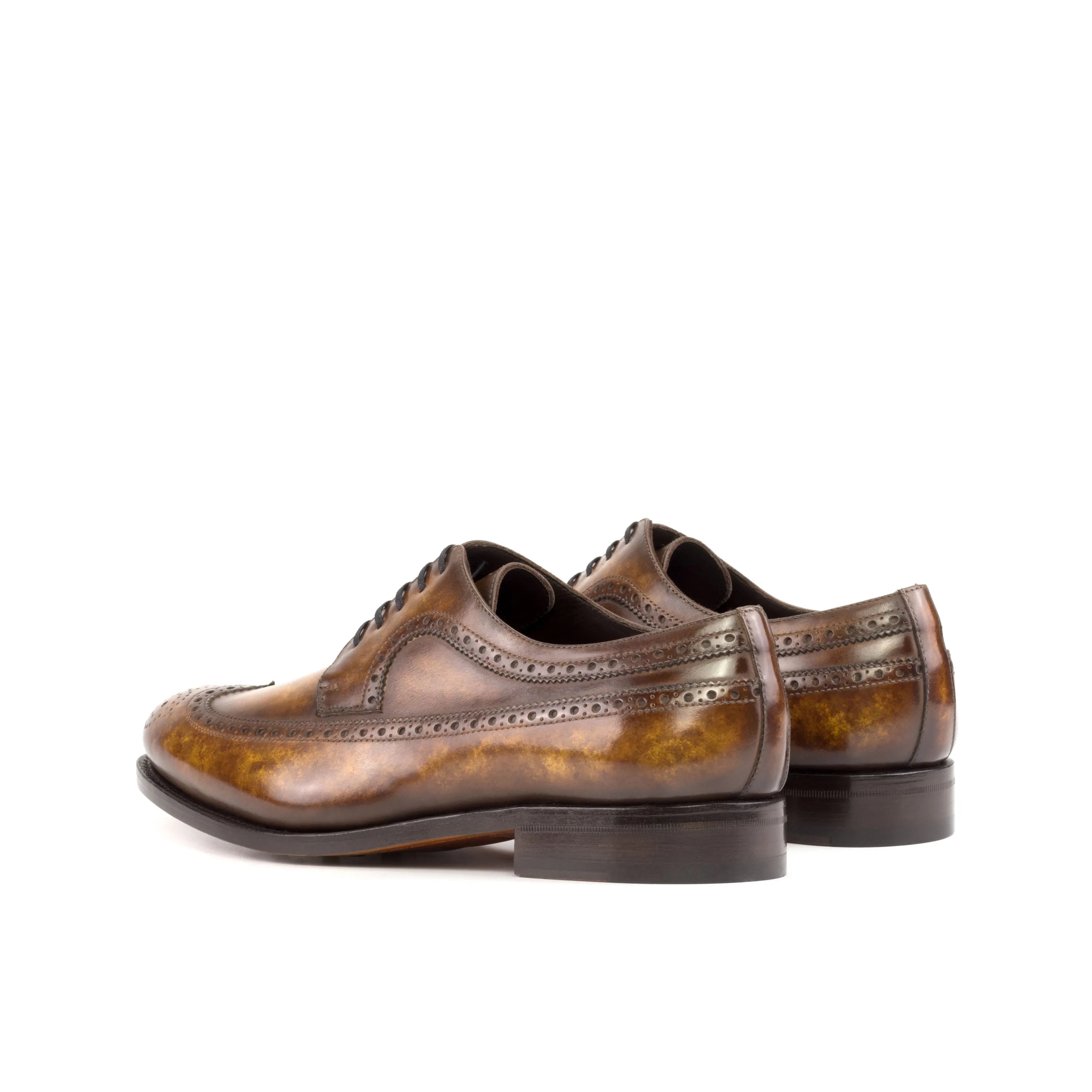 Brown leather wingtip dress shoes, featuring Legend Patina Longwing Blucher design
