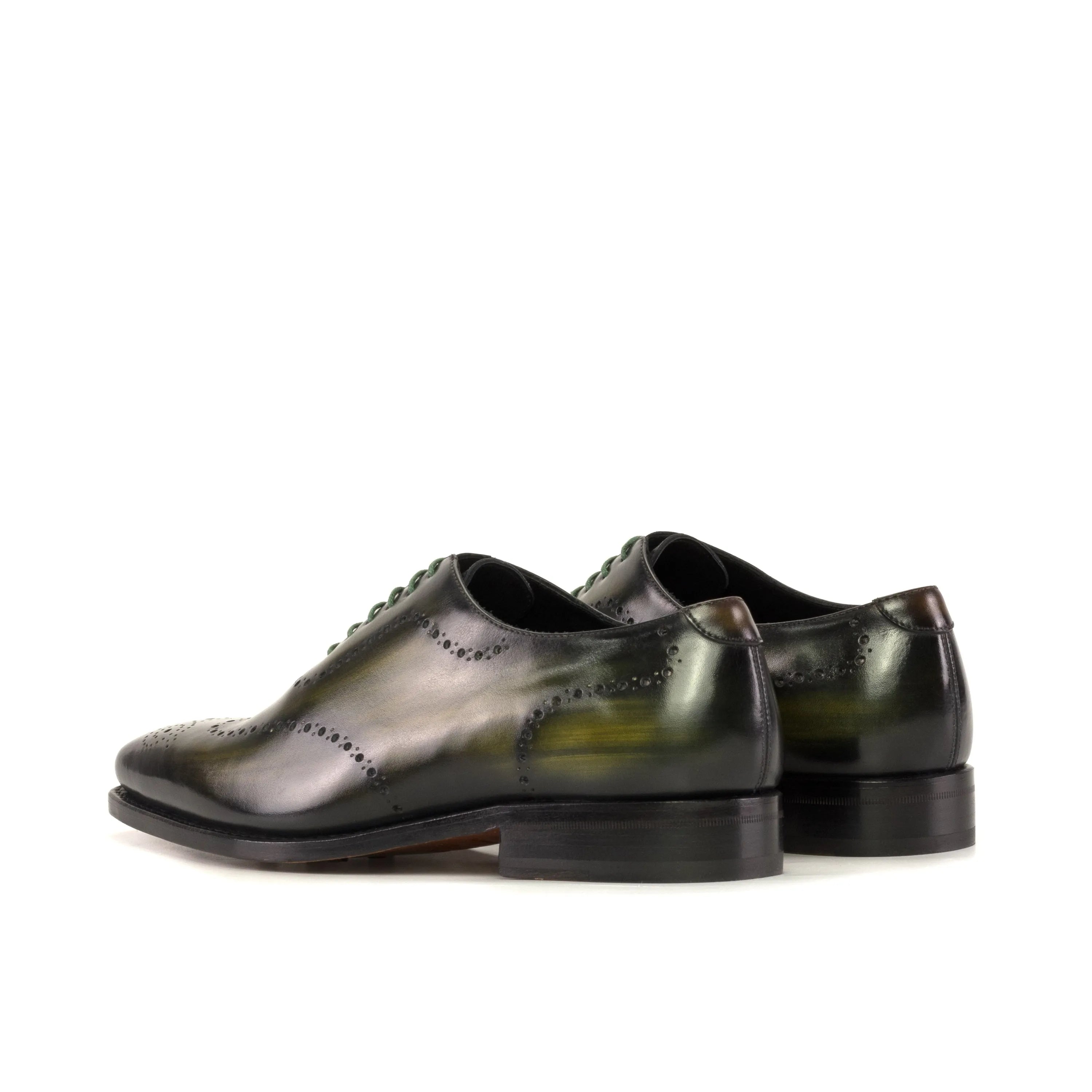 Green leather Lequa Wholecut Patina shoes showcasing elegant patina craftsmanship