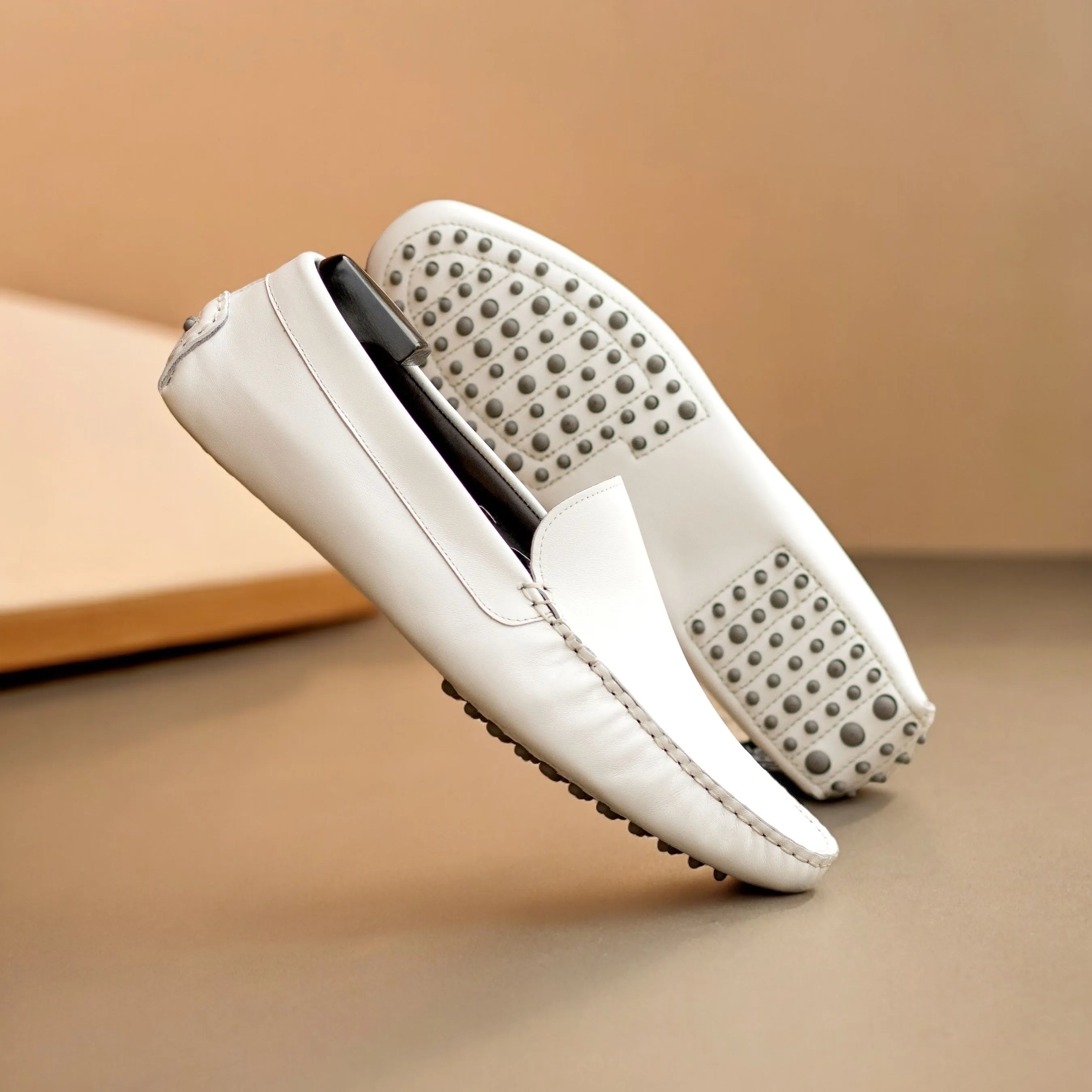 Pair of white leather Lincoln RD Driver loafers for stylish and comfortable driving