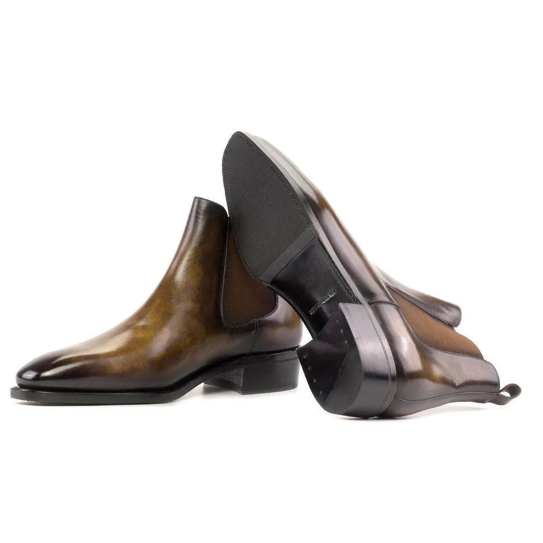 Pair of brown leather Lorenzo Patina Chelsea boots with a stylish design and finish