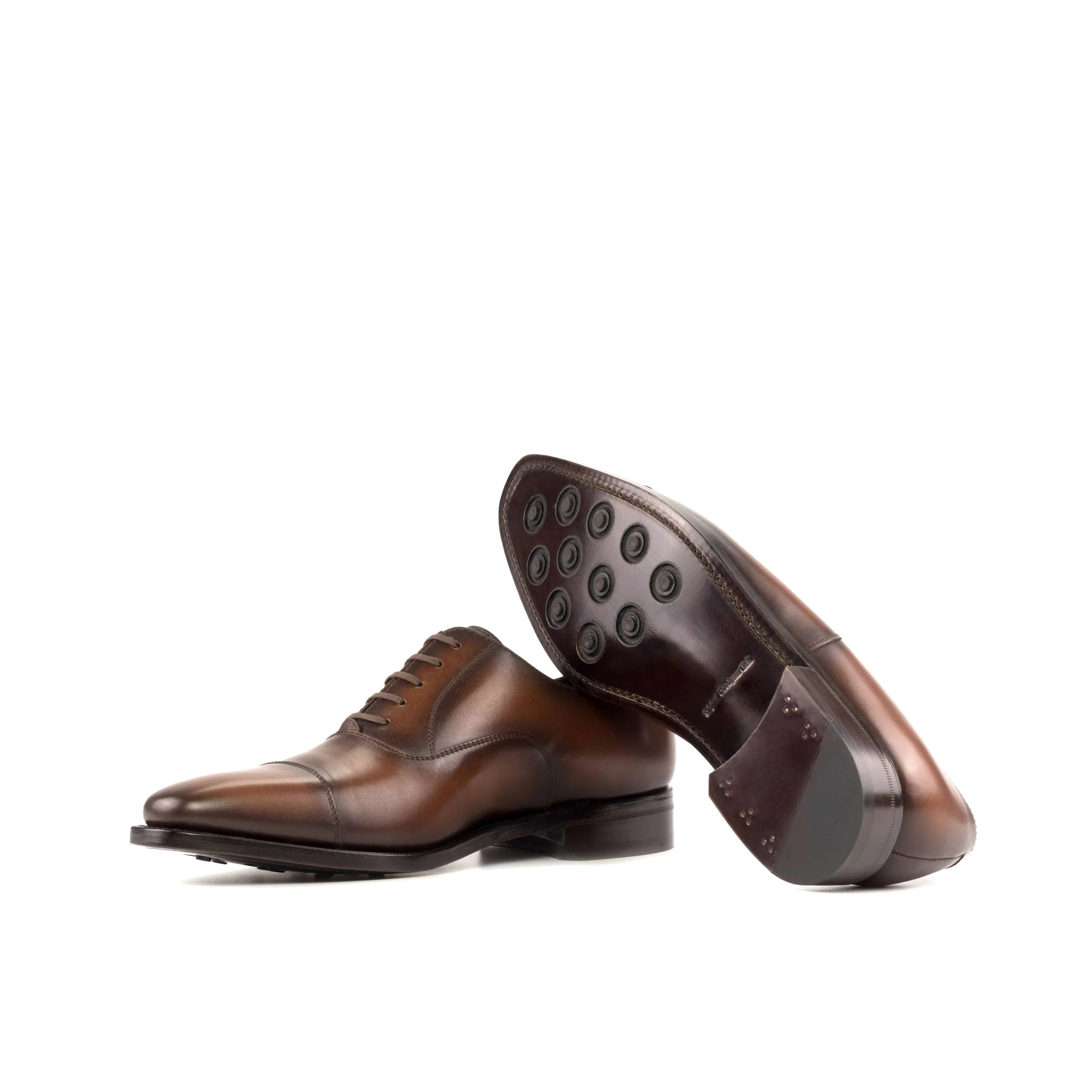 Pair of brown leather Mady Oxford shoes for a stylish fast lane look