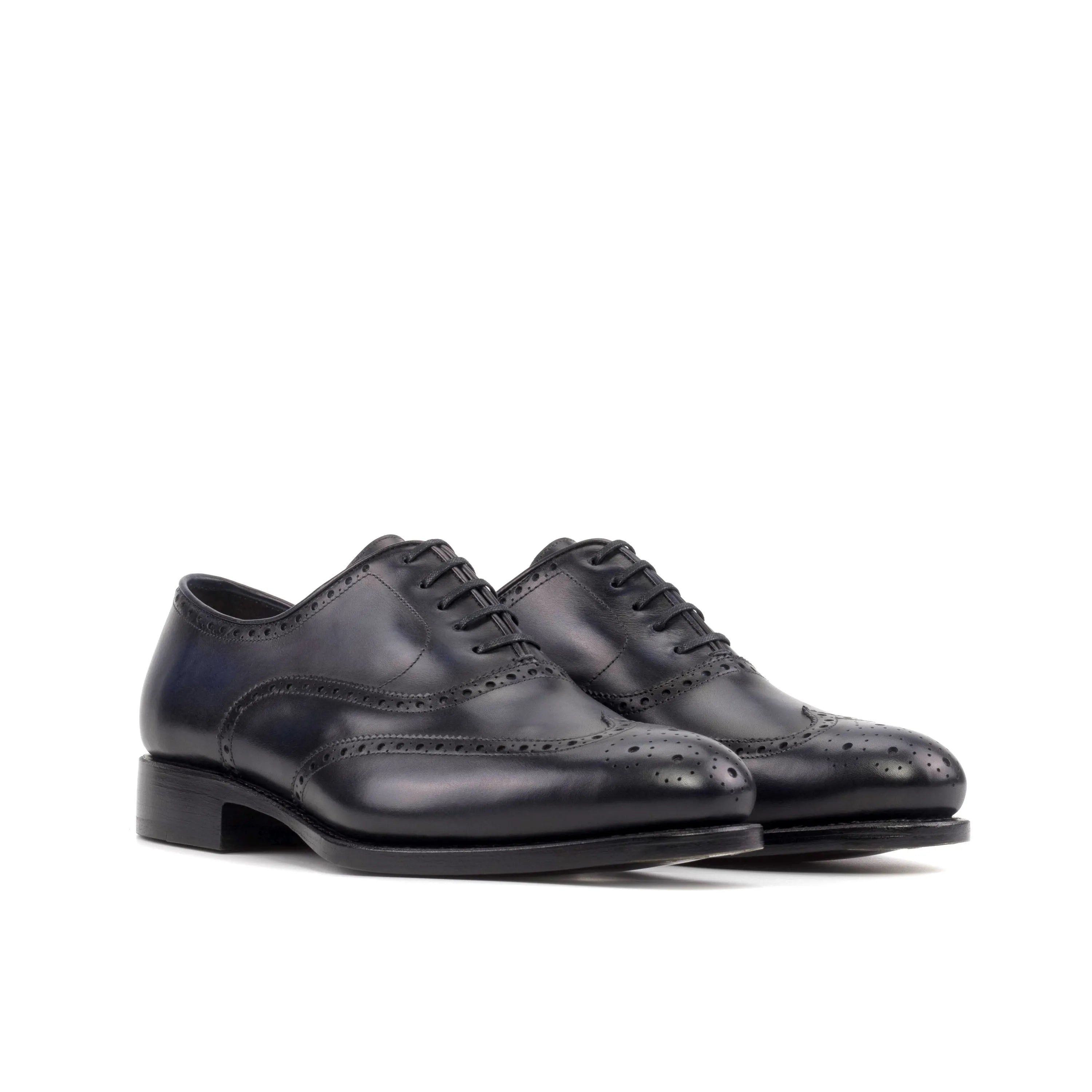 Pair of black leather dress shoes, Majestic Full Brogue Shoes for the fast lane lifestyle