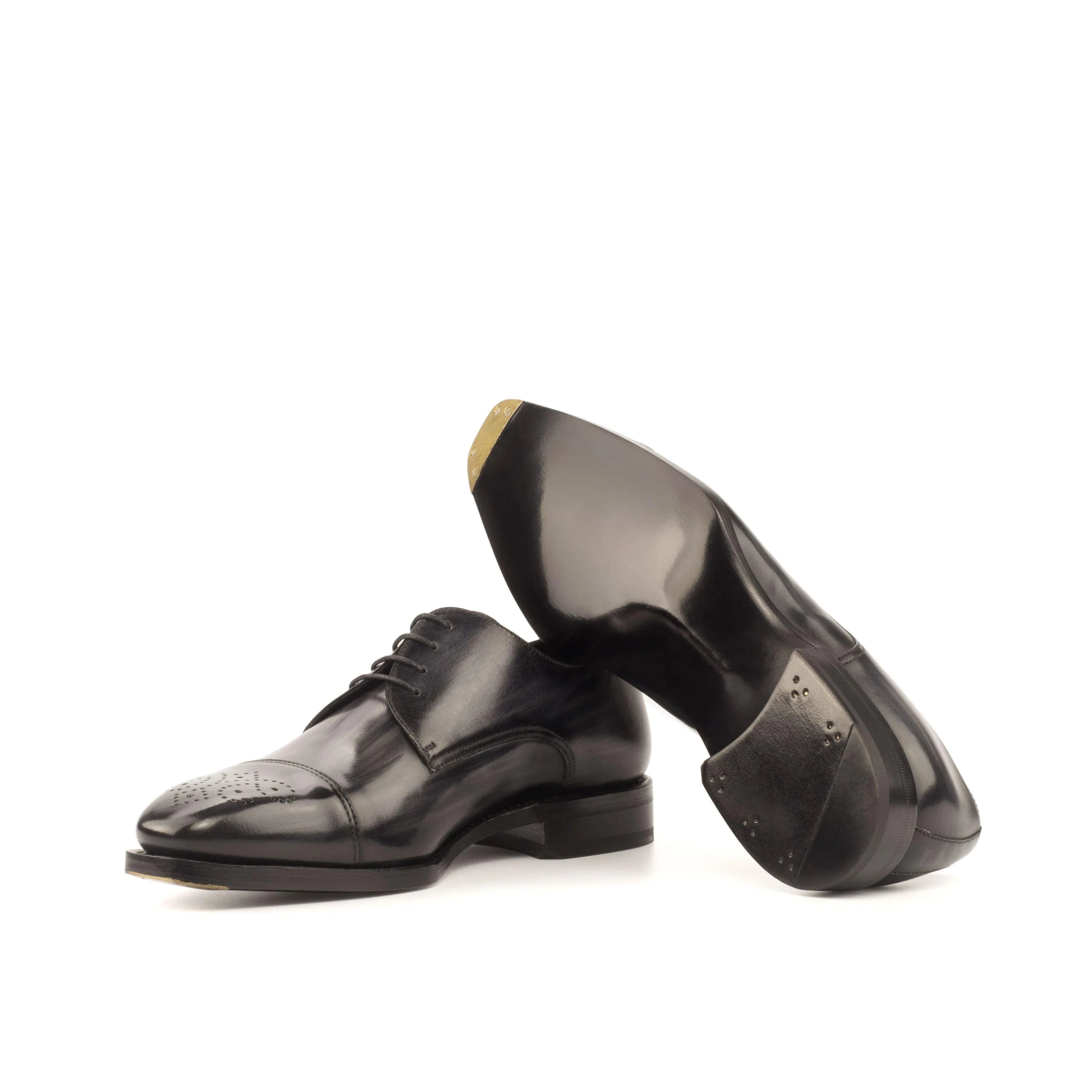 Pair of shiny black leather Marion Patina Derby dress shoes with derby split toe design