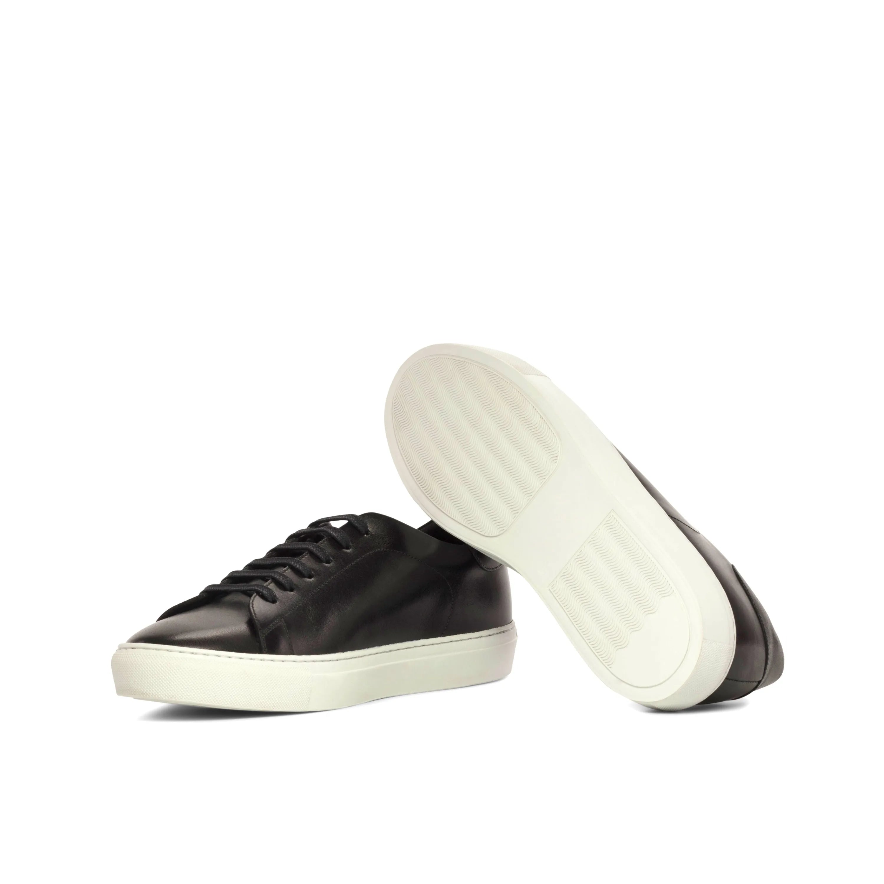 Black leather Marko Trainer Sneakers with white cupsole, perfect for a fast lane lifestyle
