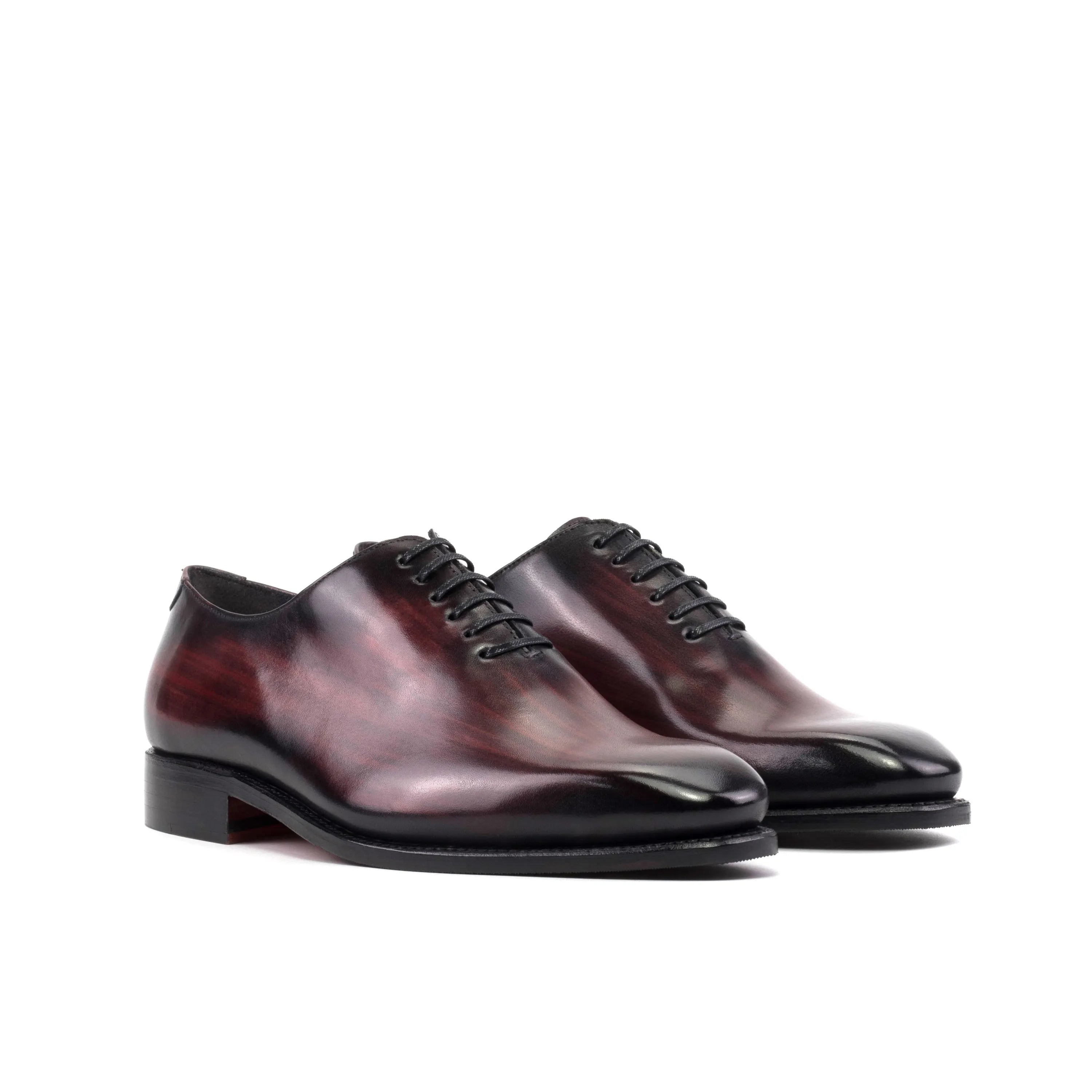 Burgundy leather Mercure Patina Wholecut shoes showcasing elegant craftsmanship