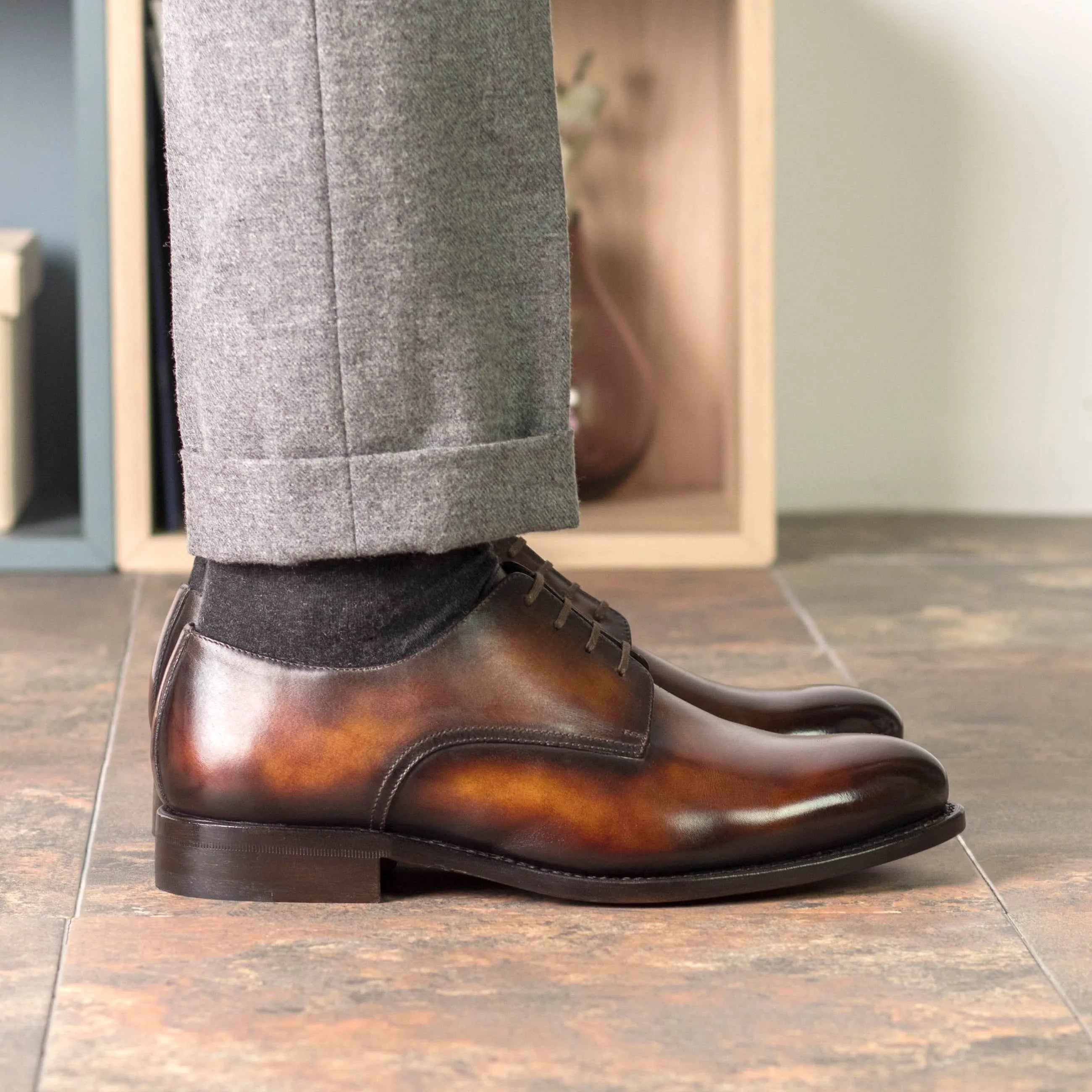 Brown leather Mikeal Patina Derby shoes displayed stylishly for the fast lane