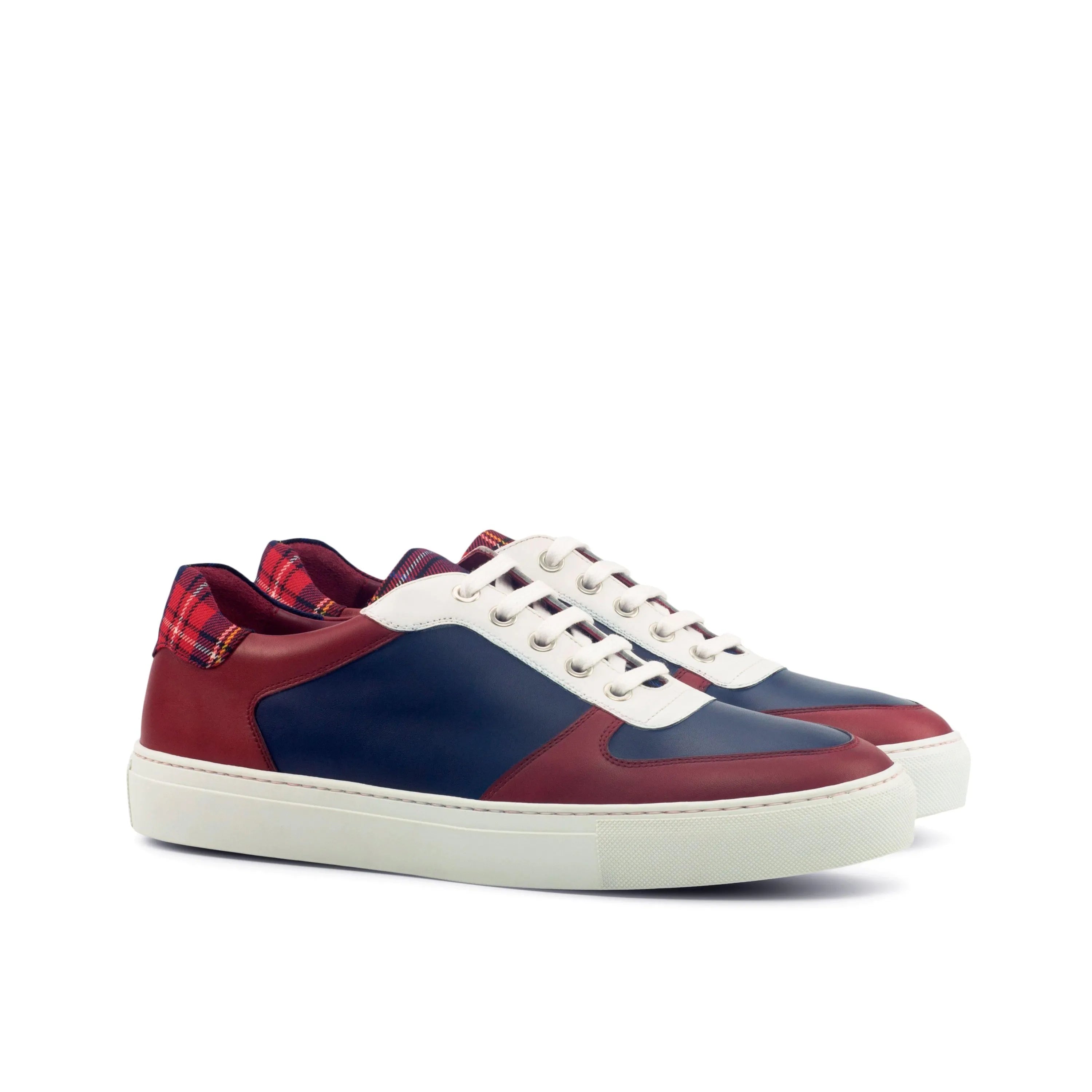 Stylish color-blocked Milo Low Top Sneakers featuring painted calf leather design