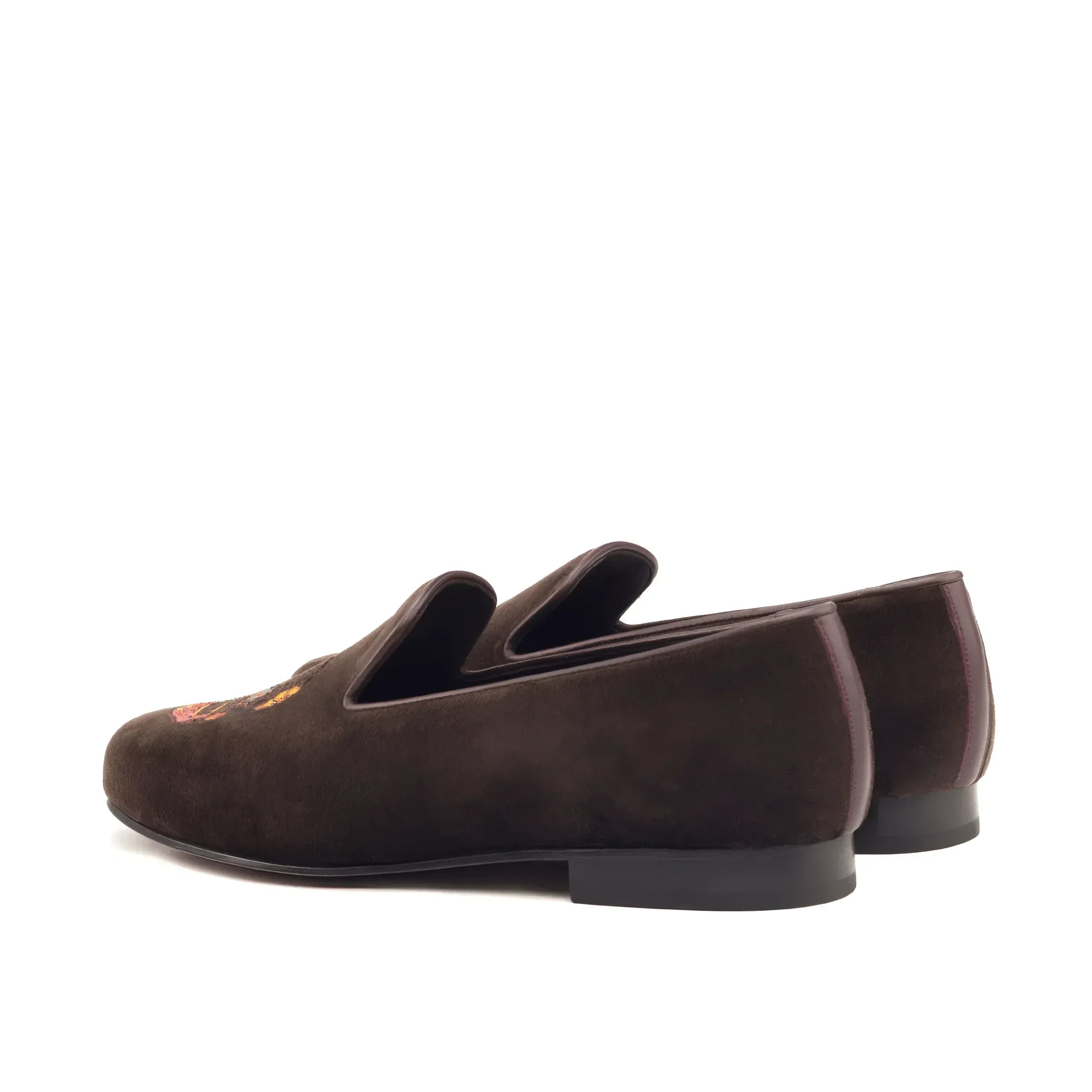 Brown suede loafers with embroidery from the Mizarble Wellington slip collection