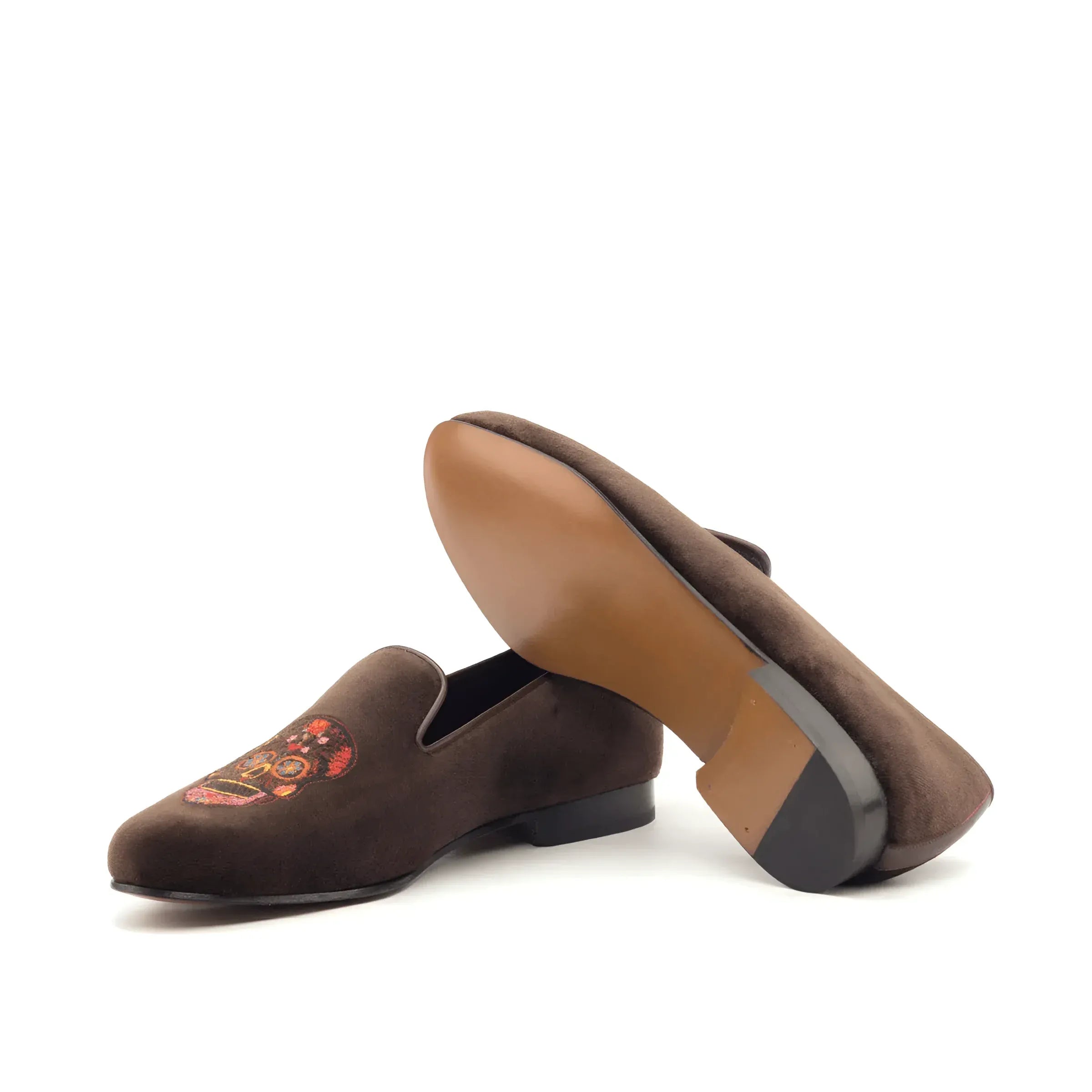 Brown suede loafers featuring embroidered design from Mizarble Wellington slip collection