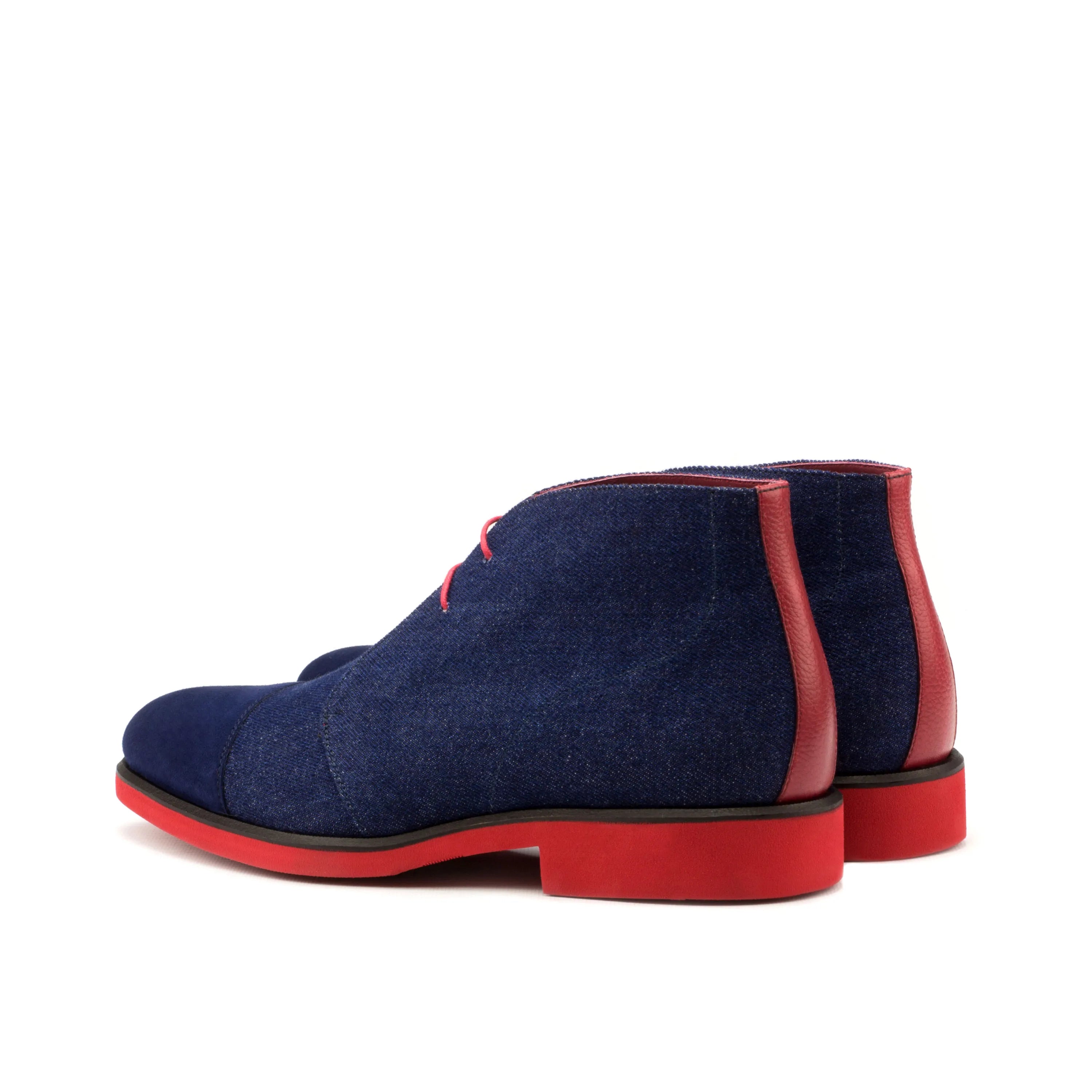 Blue suede Narek Chukkas with distinctive red soles for a stylish look