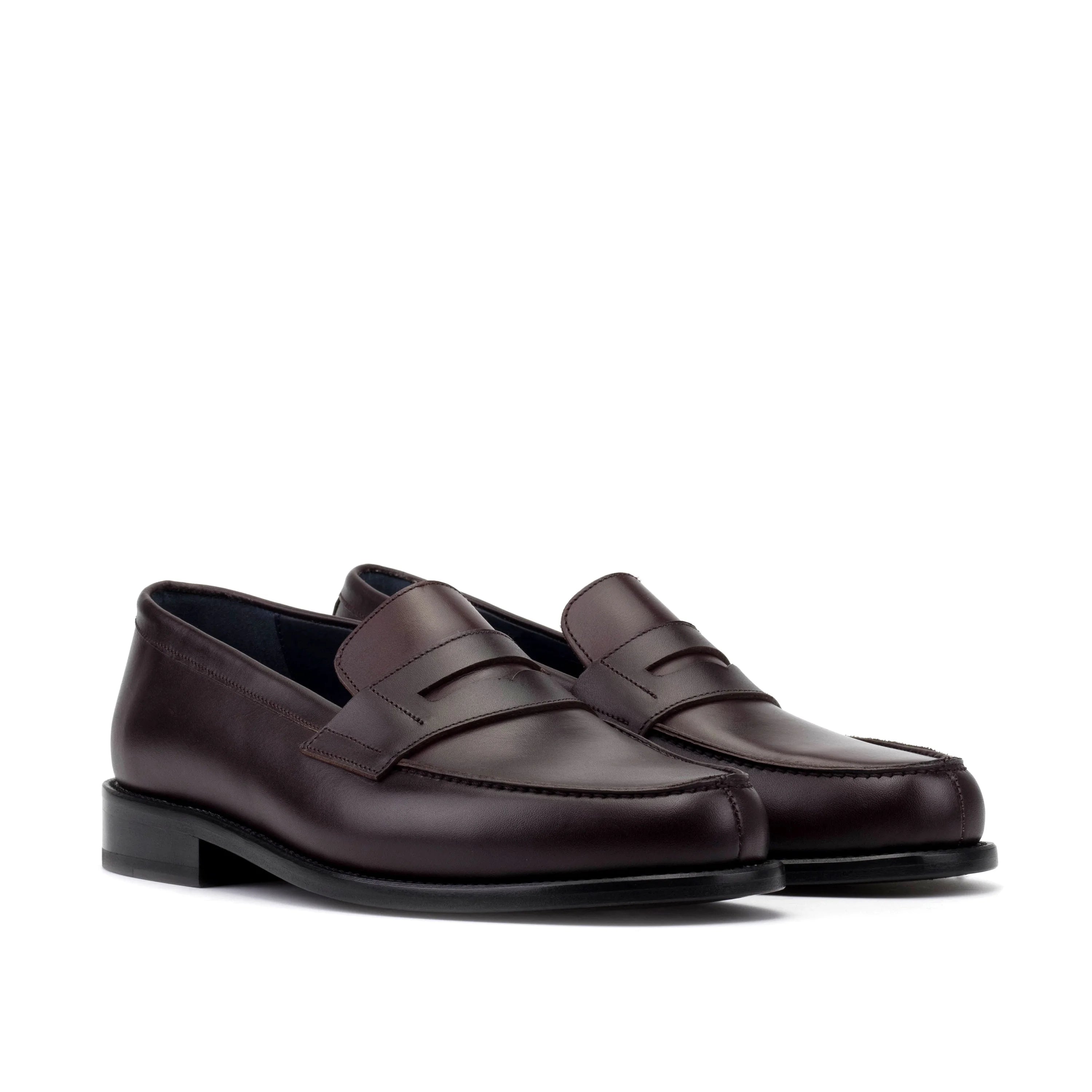 Dark brown leather office penny loafers with black rubber soles