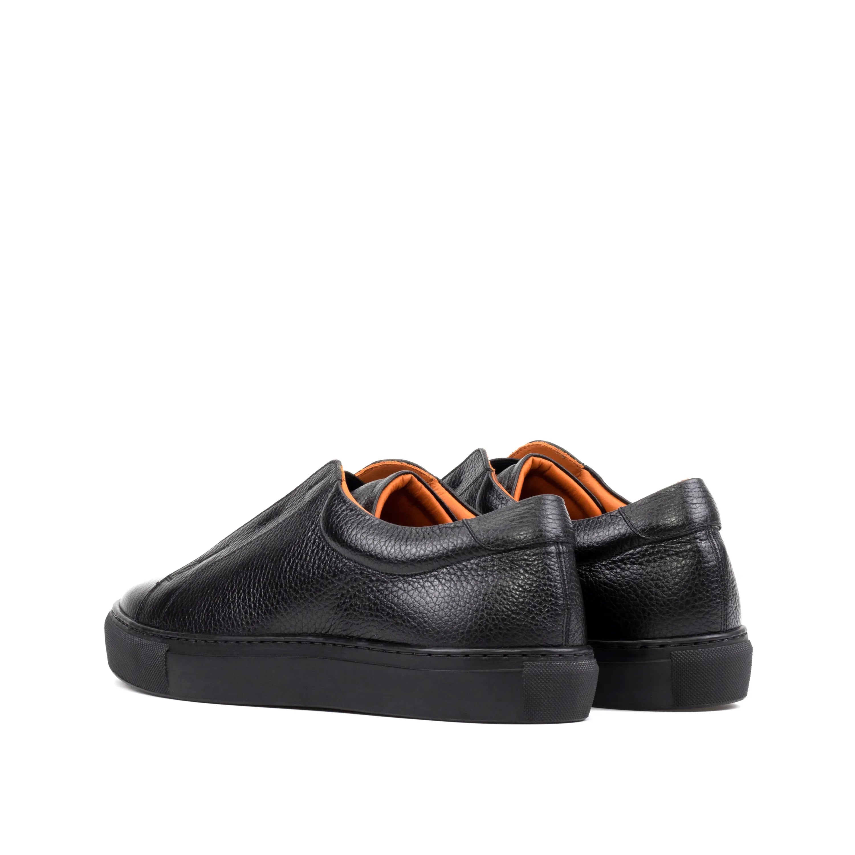 Pair of black leather Ordogan Laceless Sneakers II showcasing sleek design and comfort