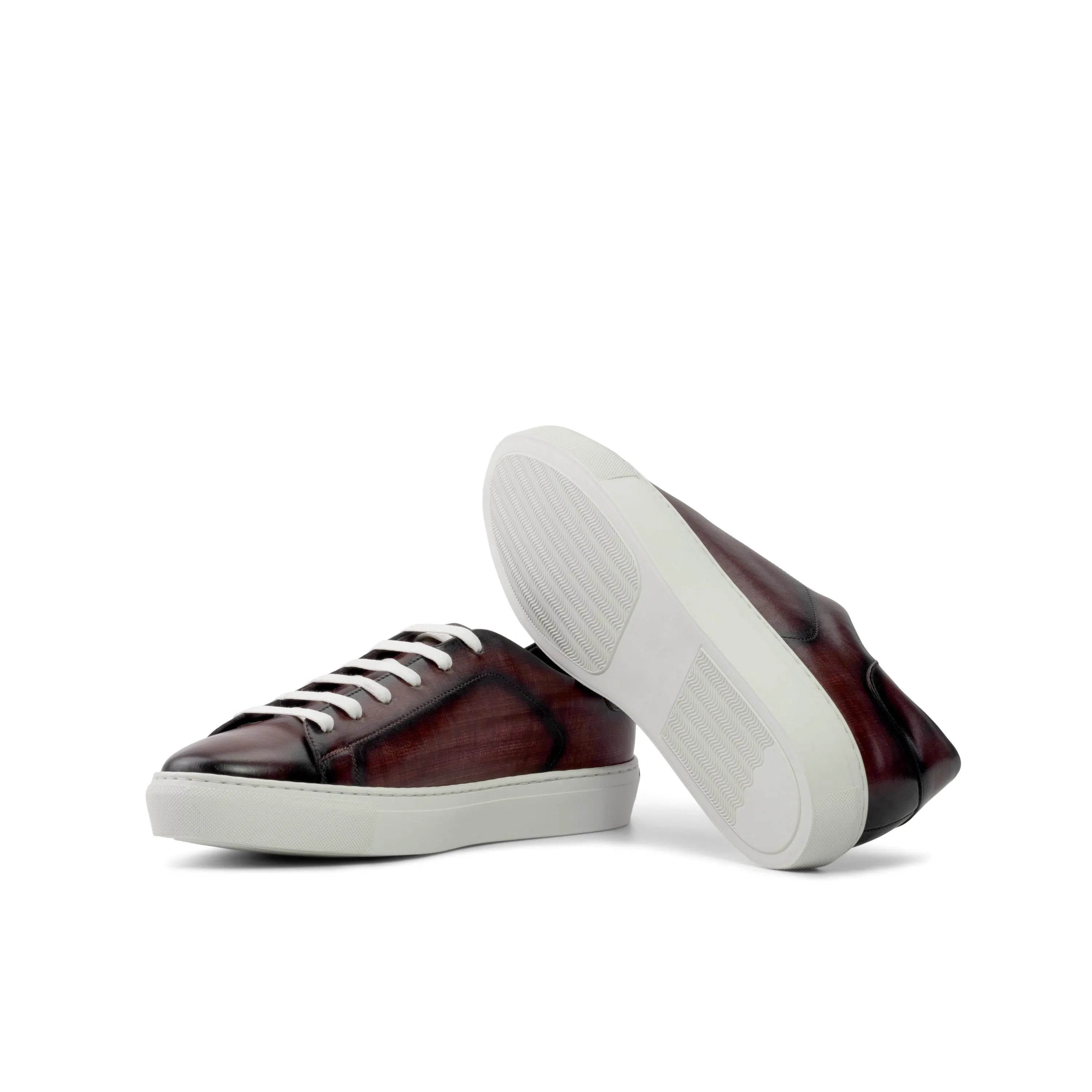 Burgundy leather Orion Trainer Patina sneakers with cupsole design, stylish and versatile