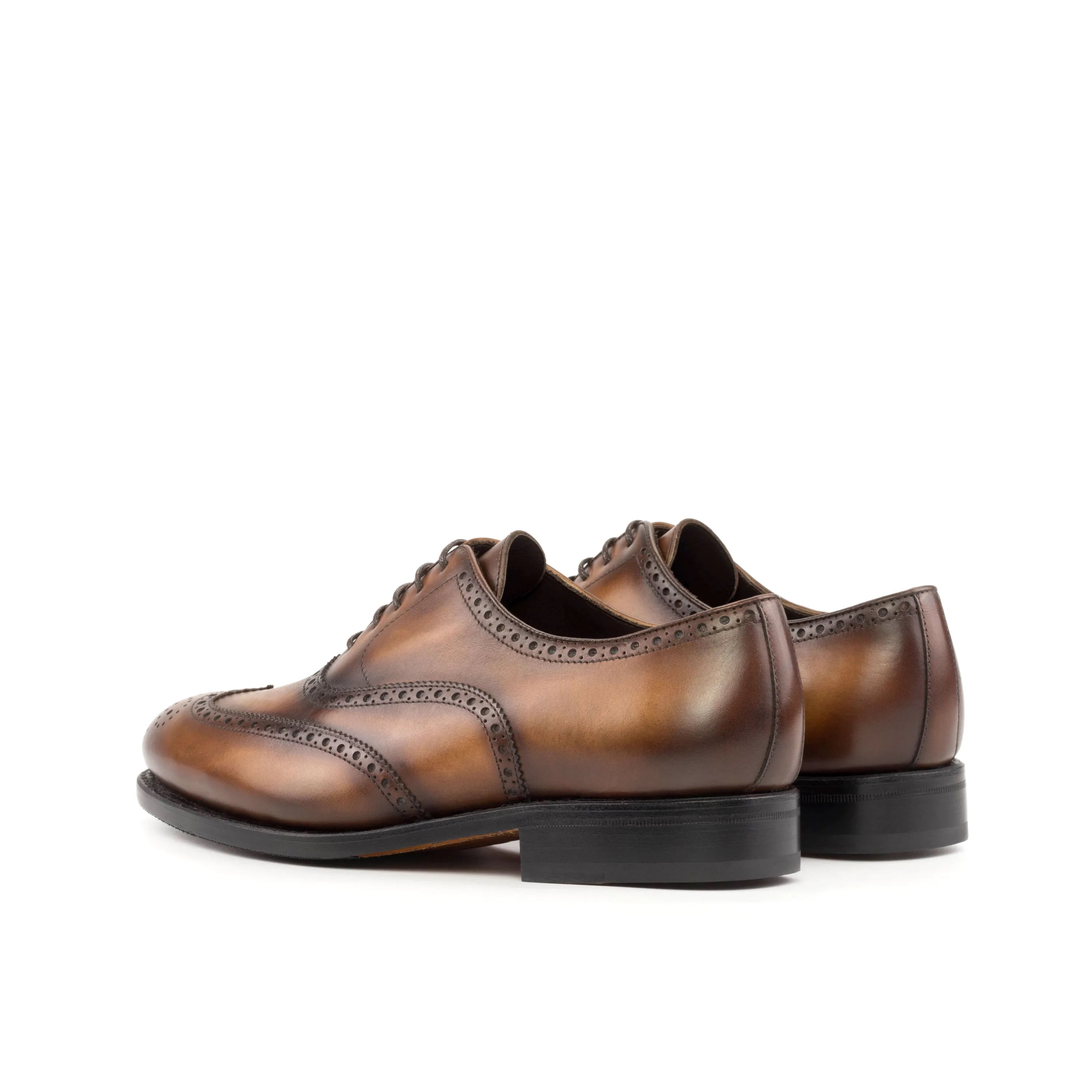 Brown leather wingtip brogue shoes for a polished look in the fast lane of fashion