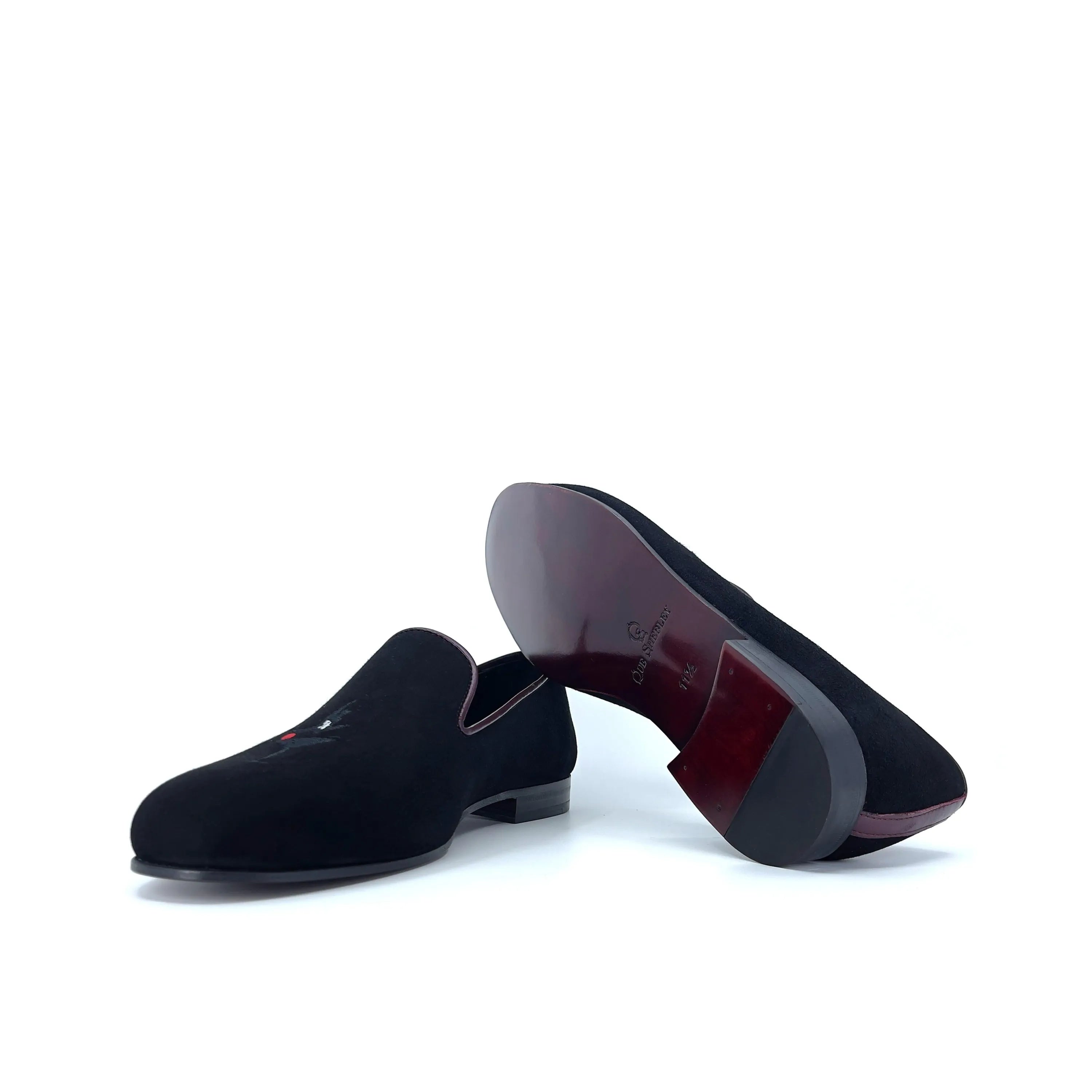 Pair of black velvet loafers featuring the Pete Wellington Slipon design