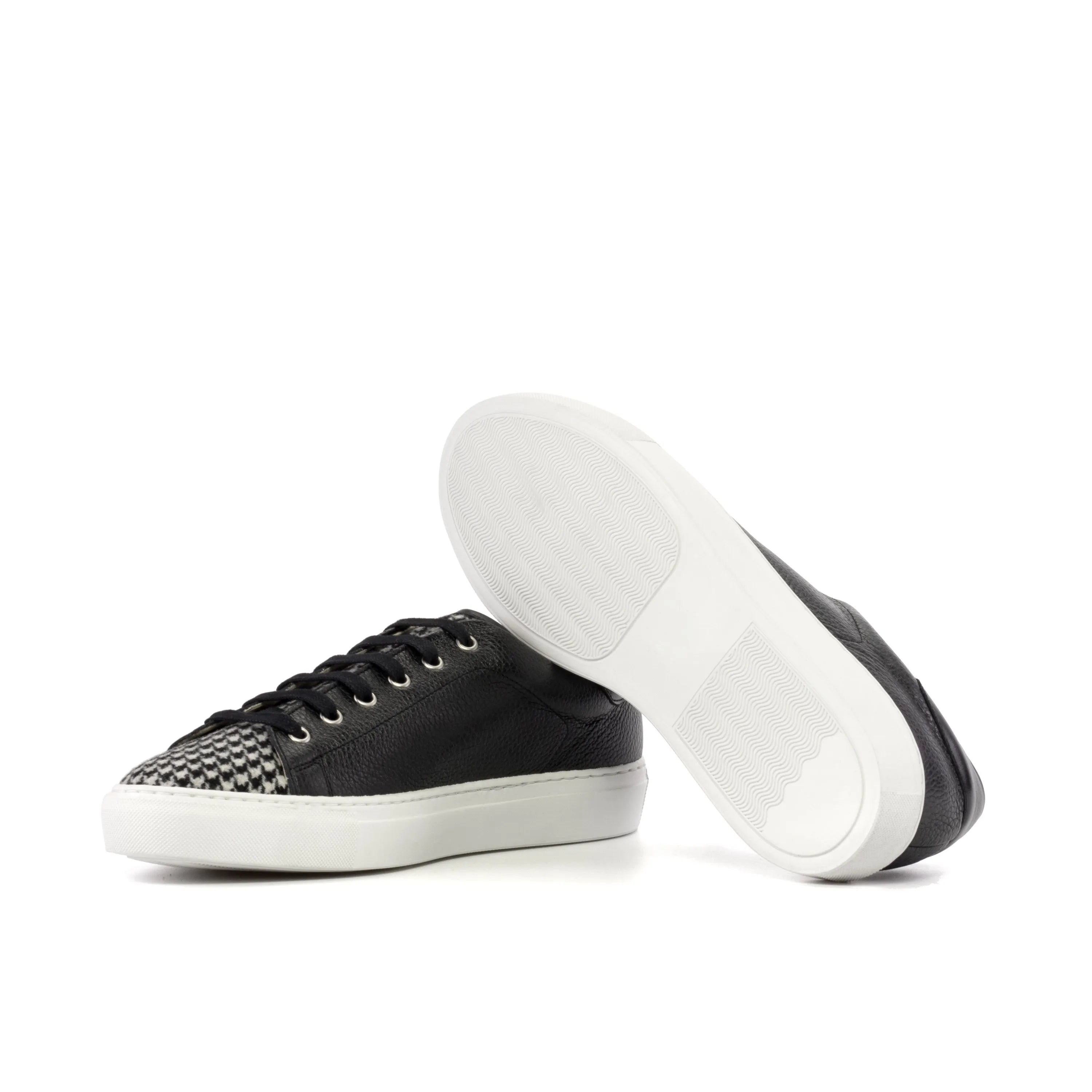 Black leather Polando Trainer Sneaker featuring stylish white soles for versatile wear