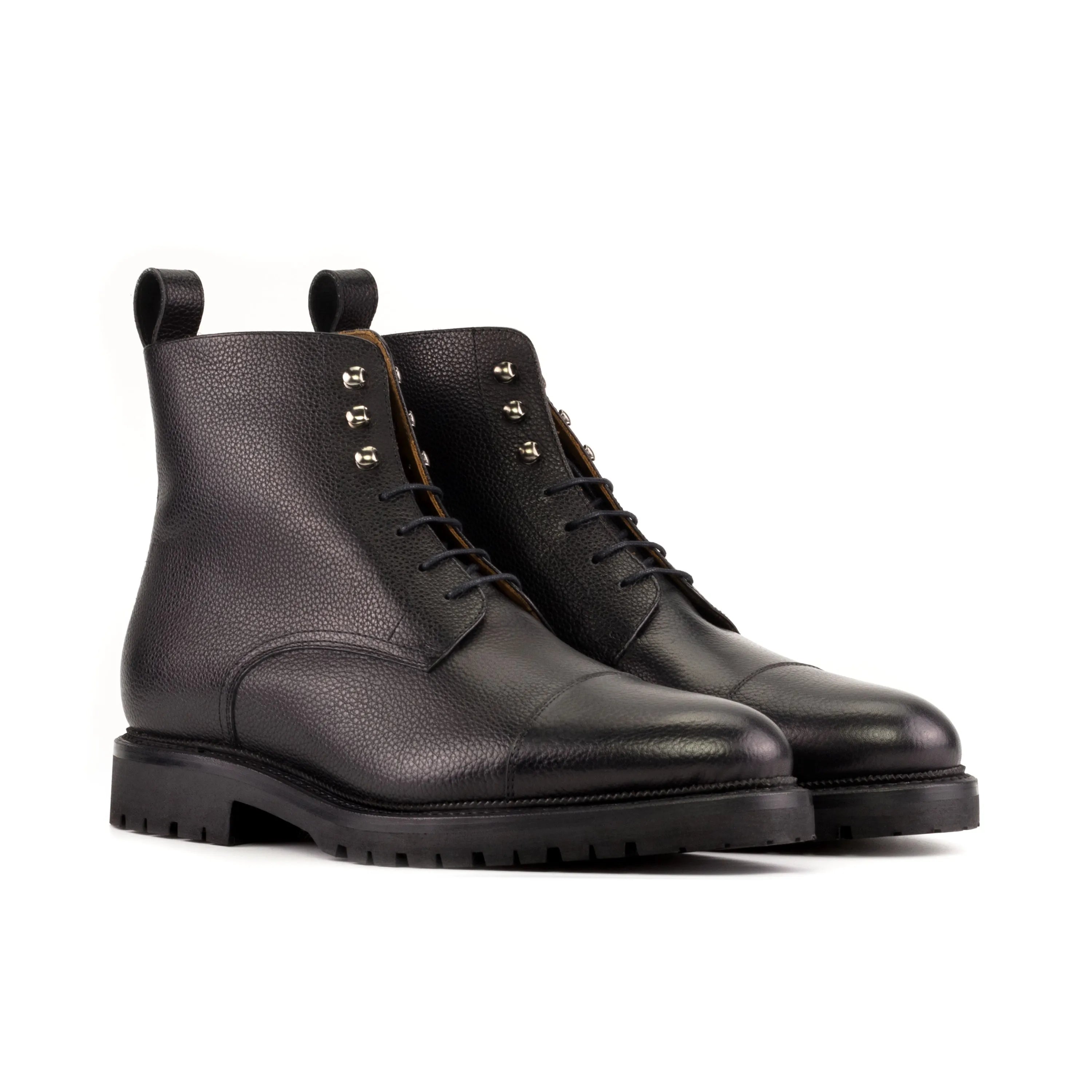 Black leather lace-up Primus Jumper Boots showcasing style and durability