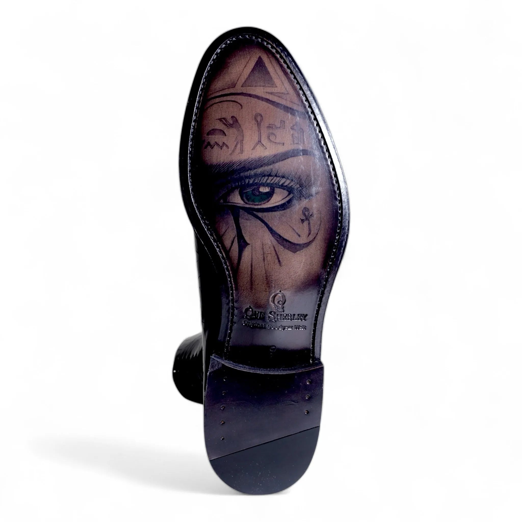 Black dress shoe with Egyptian-themed sole art, Quswa Noir Wholecut, Cleopatra Edition