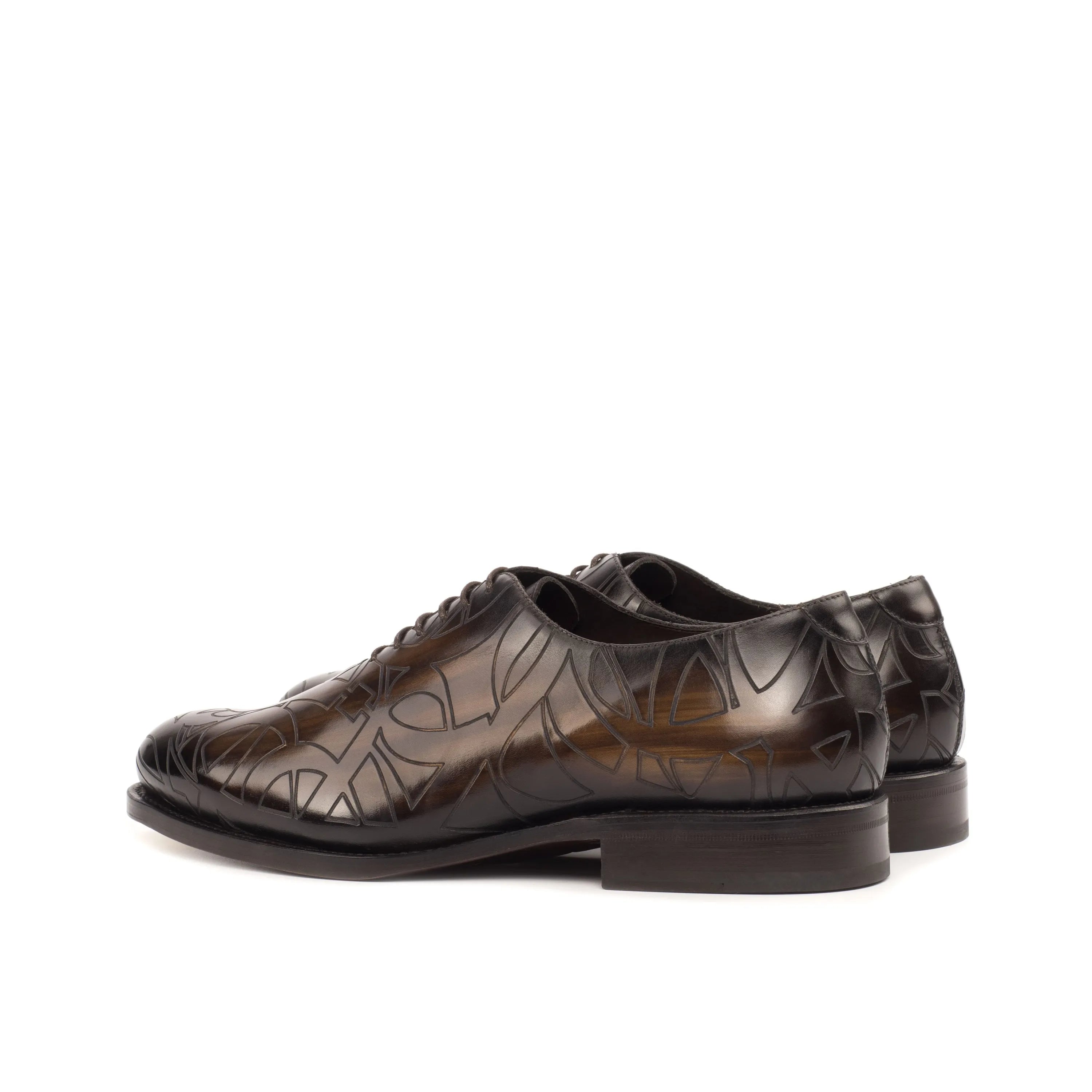 Patterned brown leather Quswa Patina Wholecut shoes featuring a fiddled waist design