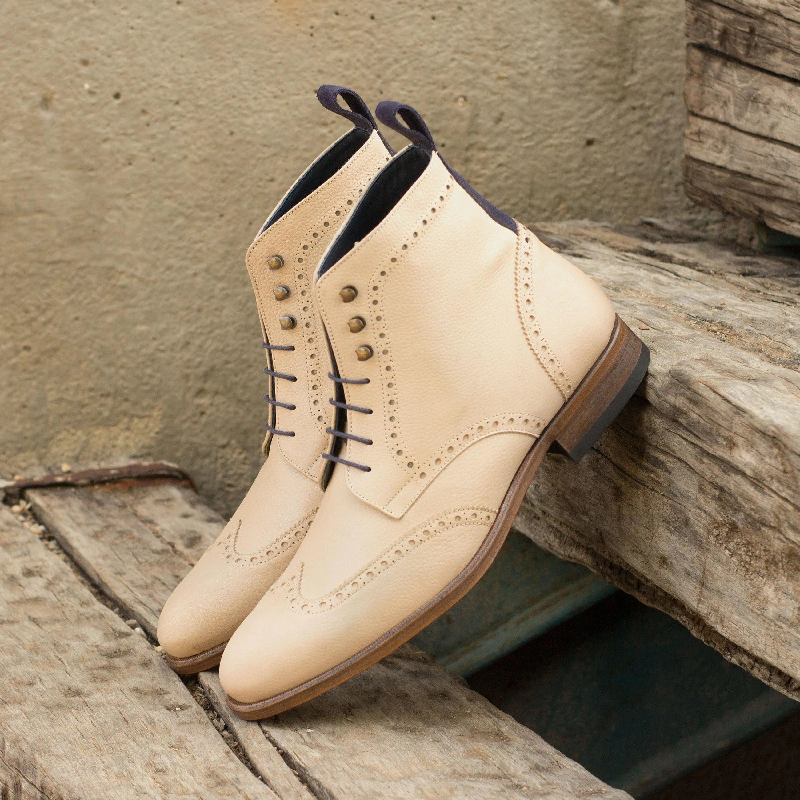 Beige leather wingtip boots from the R04 Military Brogue collection for stylish footwear