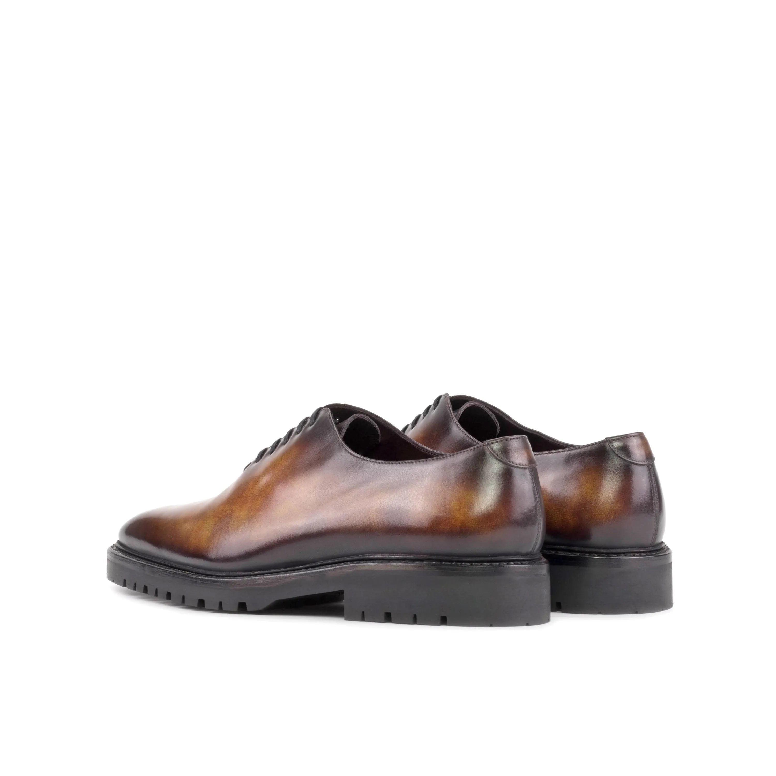 Brown leather Raigon Patina Wholecut shoes showcasing elegant craftsmanship and style