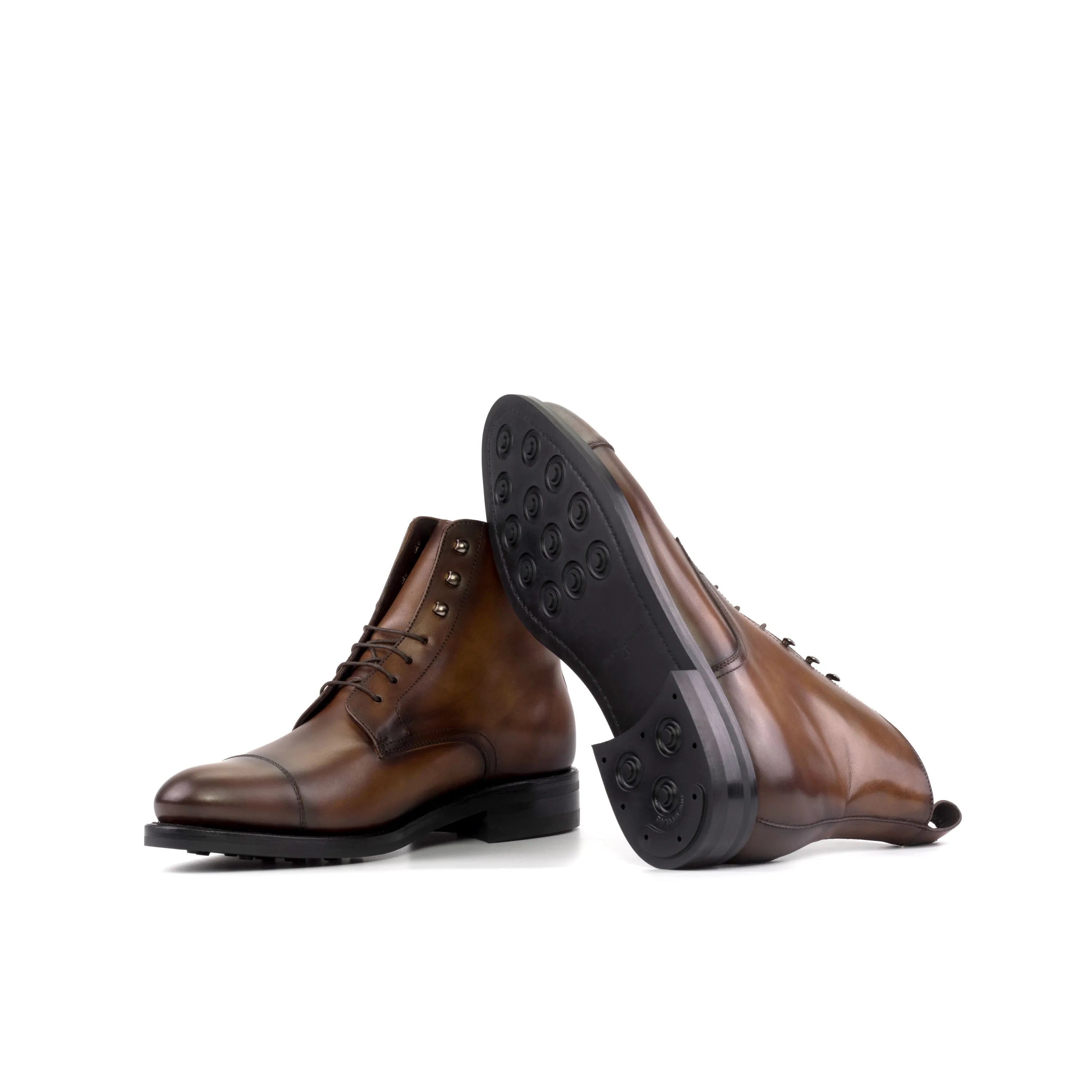 Brown leather lace-up Raj Jumper Boots designed for style and comfort in the fast lane