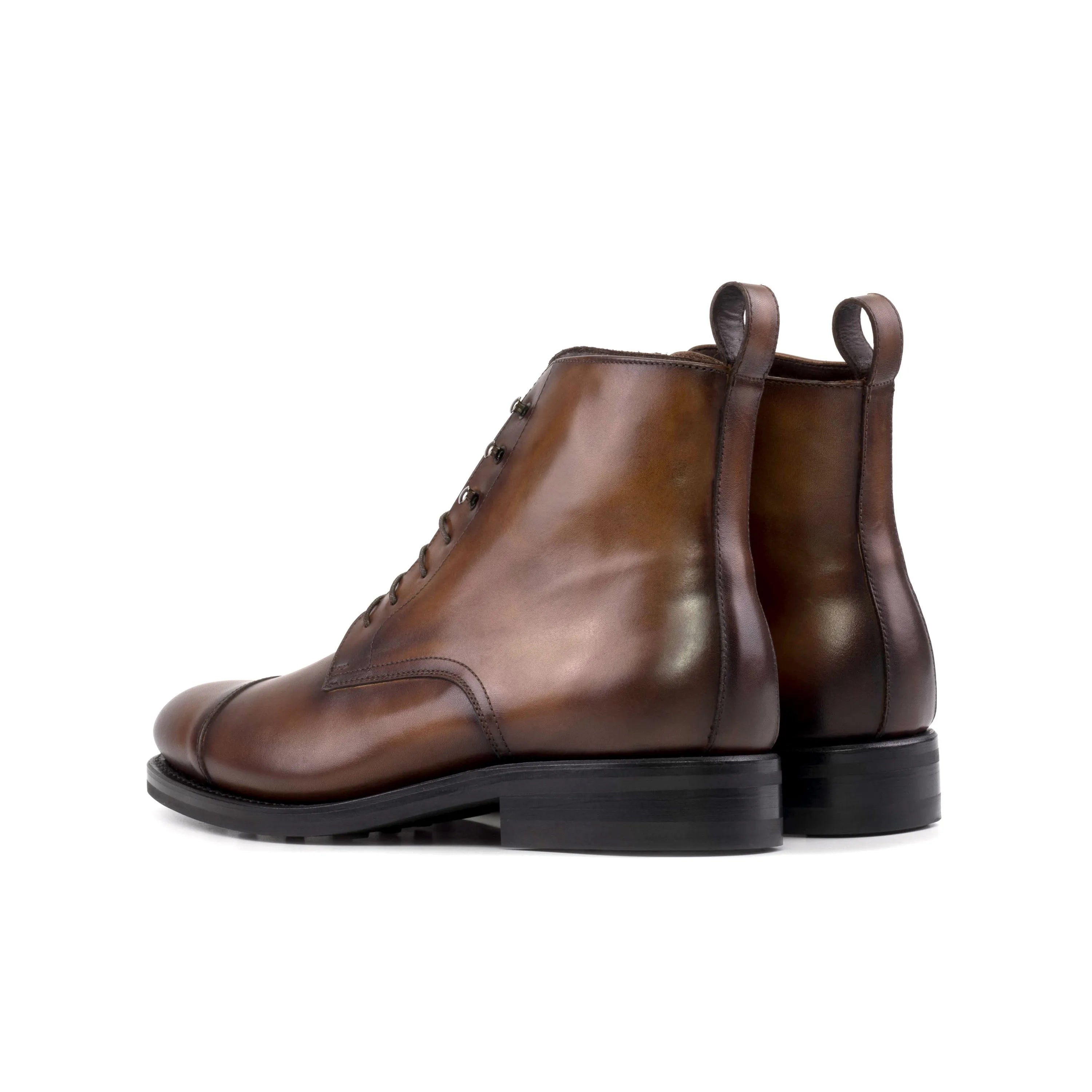 Brown leather lace-up Raj Jumper Boots for a stylish, sophisticated look in fashion