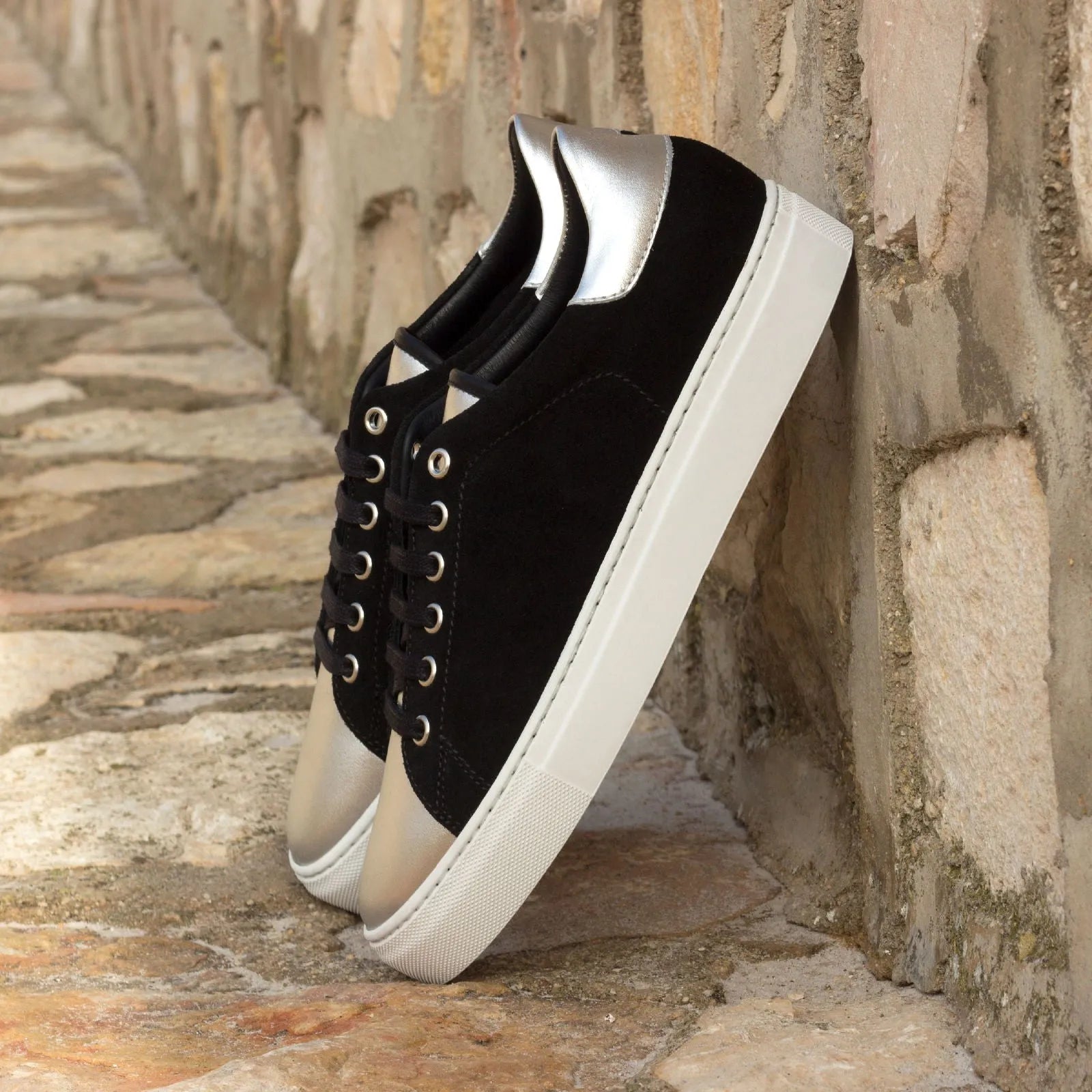 Black and silver Raulond Trainer Sneaker showcasing stylish athletic footwear design