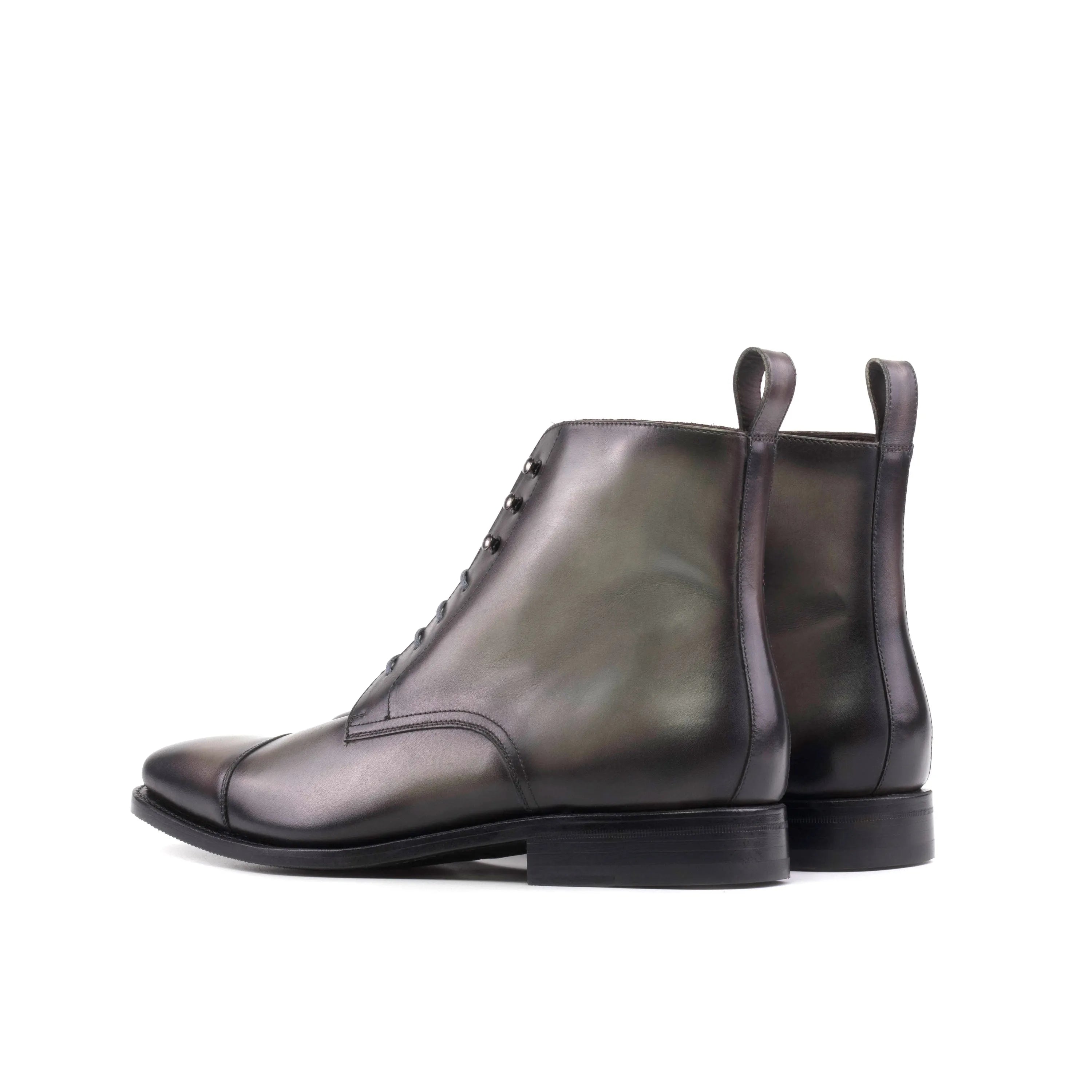 Gray leather cap-toe boots featuring Rawul Jumper Boots design and style