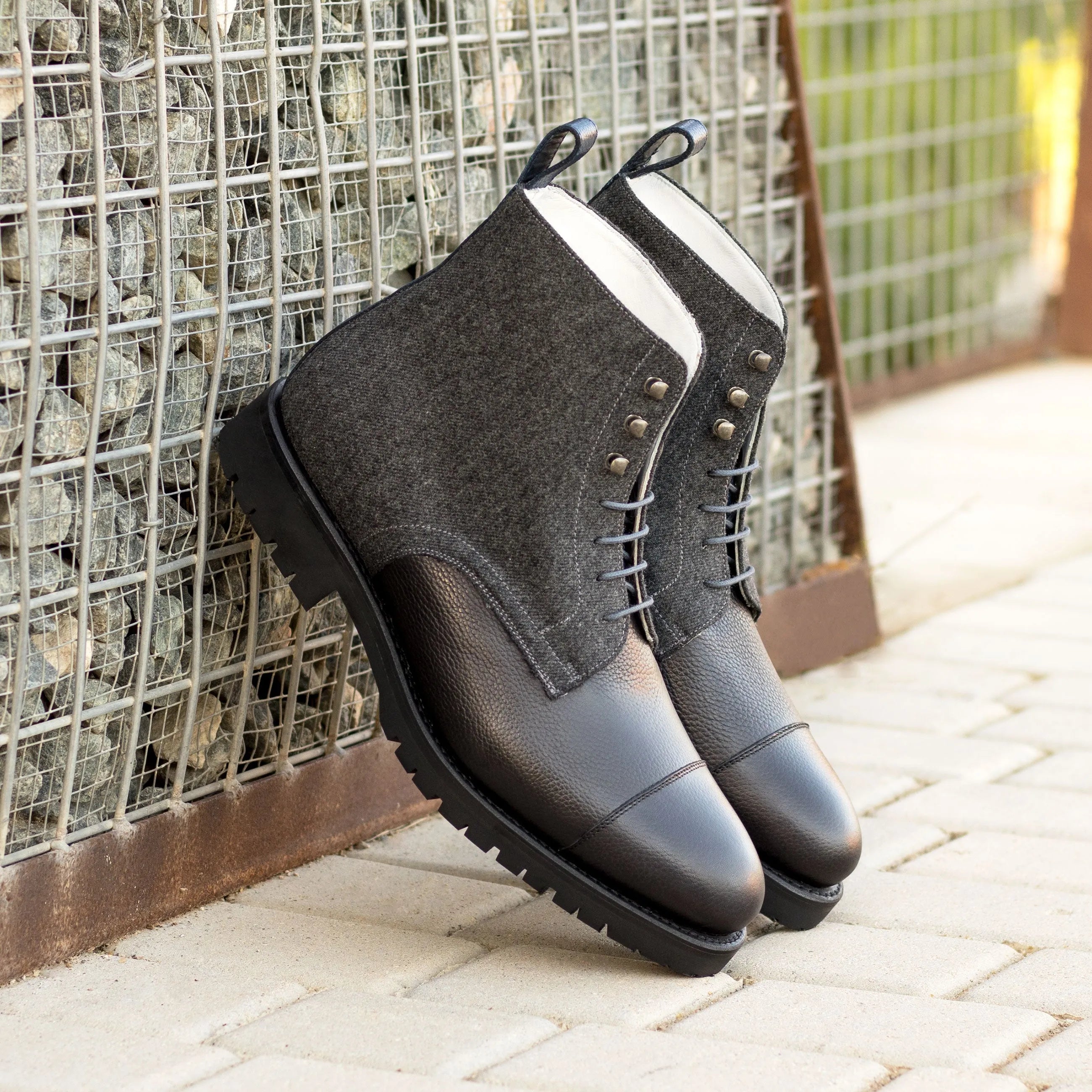 Pair of gray and black leather Rockfeild Jumper Boots for stylish footwear enthusiasts