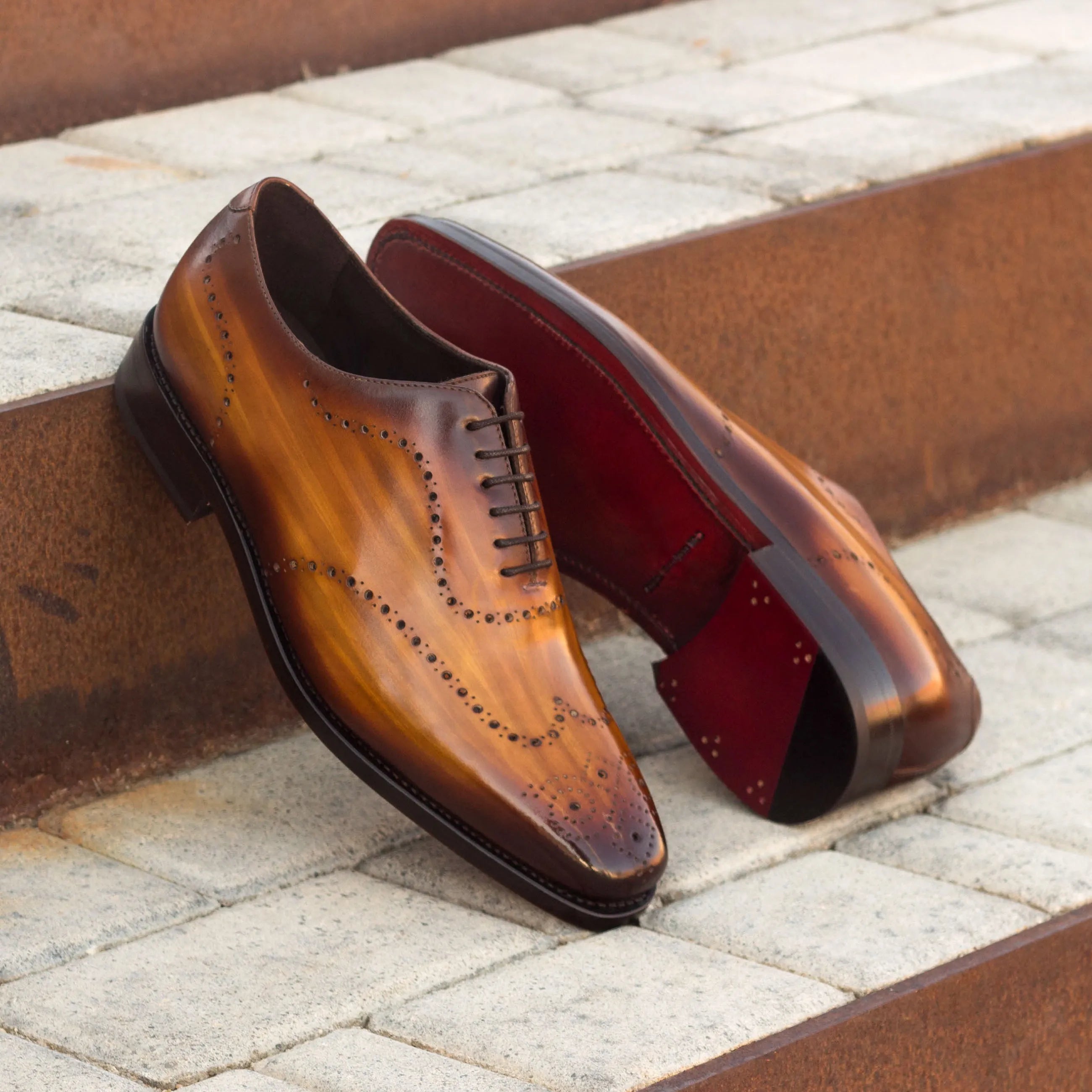 Brown leather dress shoes named Roselli Whole Cut Patina, perfect for formal occasions