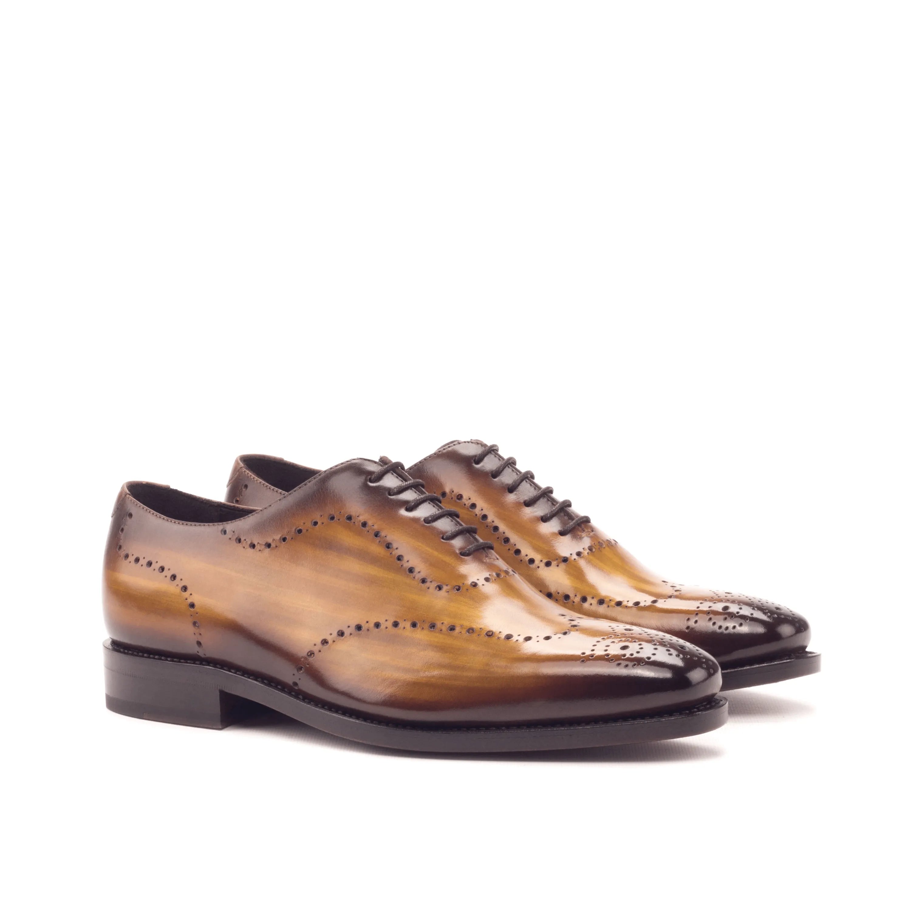 Brown leather wingtip dress shoes in Roselli Whole Cut Patina design for elegant style