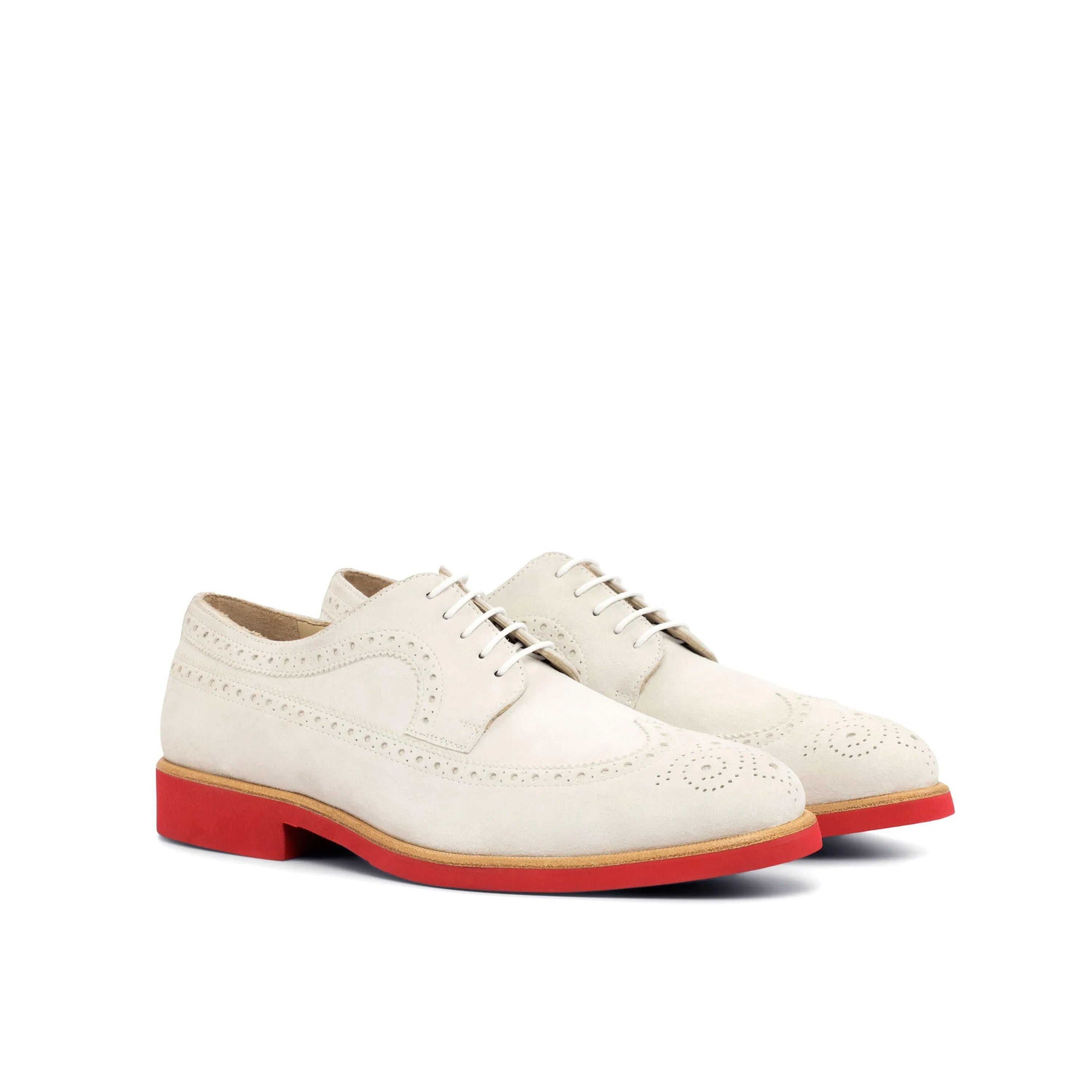White leather Saidy Longwing Blucher II dress shoes with distinctive red soles
