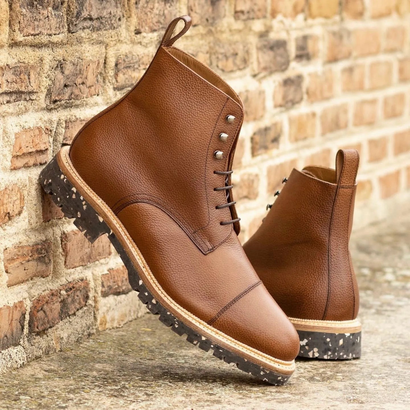 Brown leather ankle boots showcasing Senio Jumper Boots design for stylish footwear