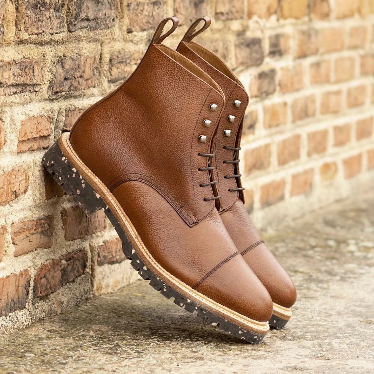 Brown leather lace-up Senio Jumper Boots stylishly designed for comfort and durability