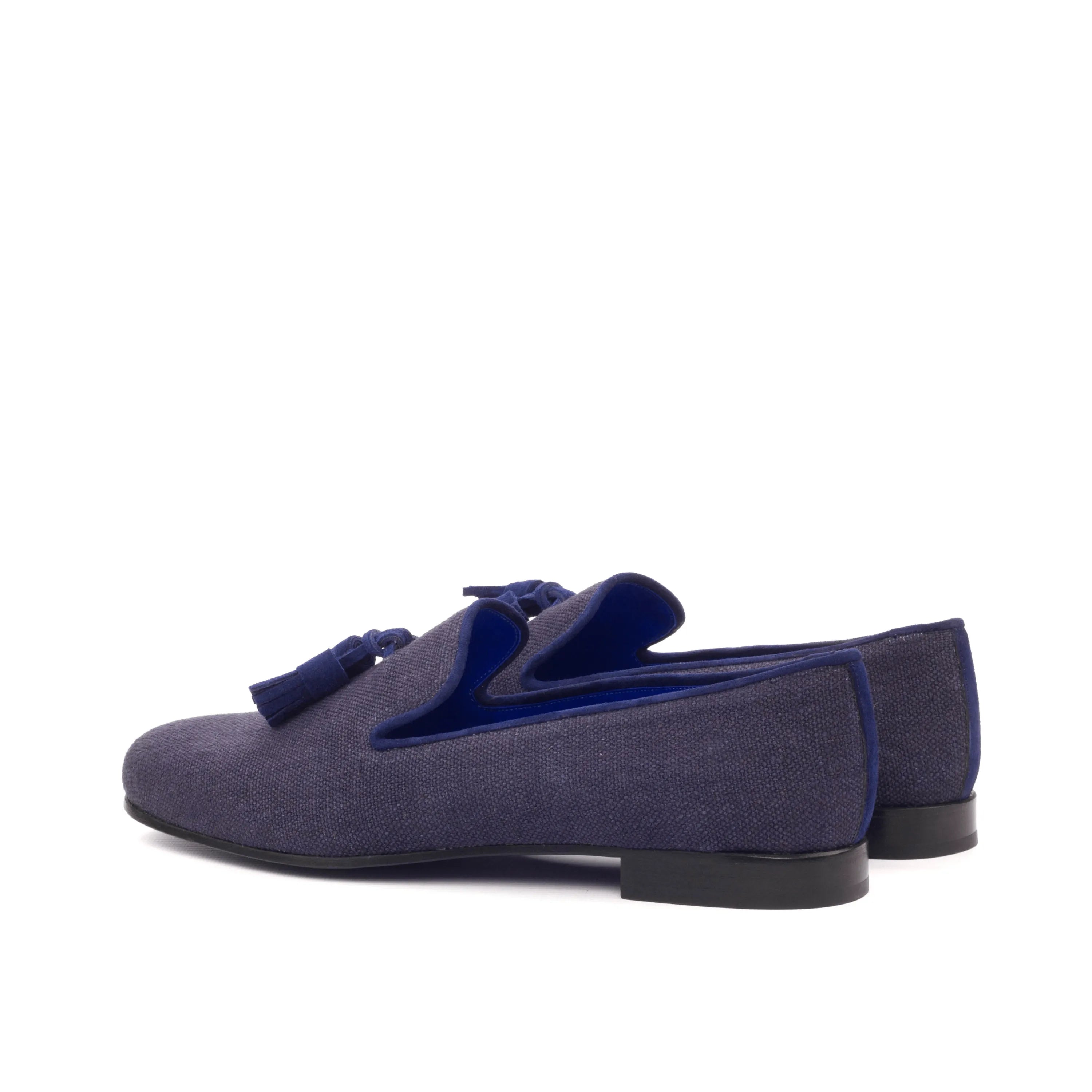 Pair of navy kid suede Sina Wellington Slipon tassel loafers for elegant style