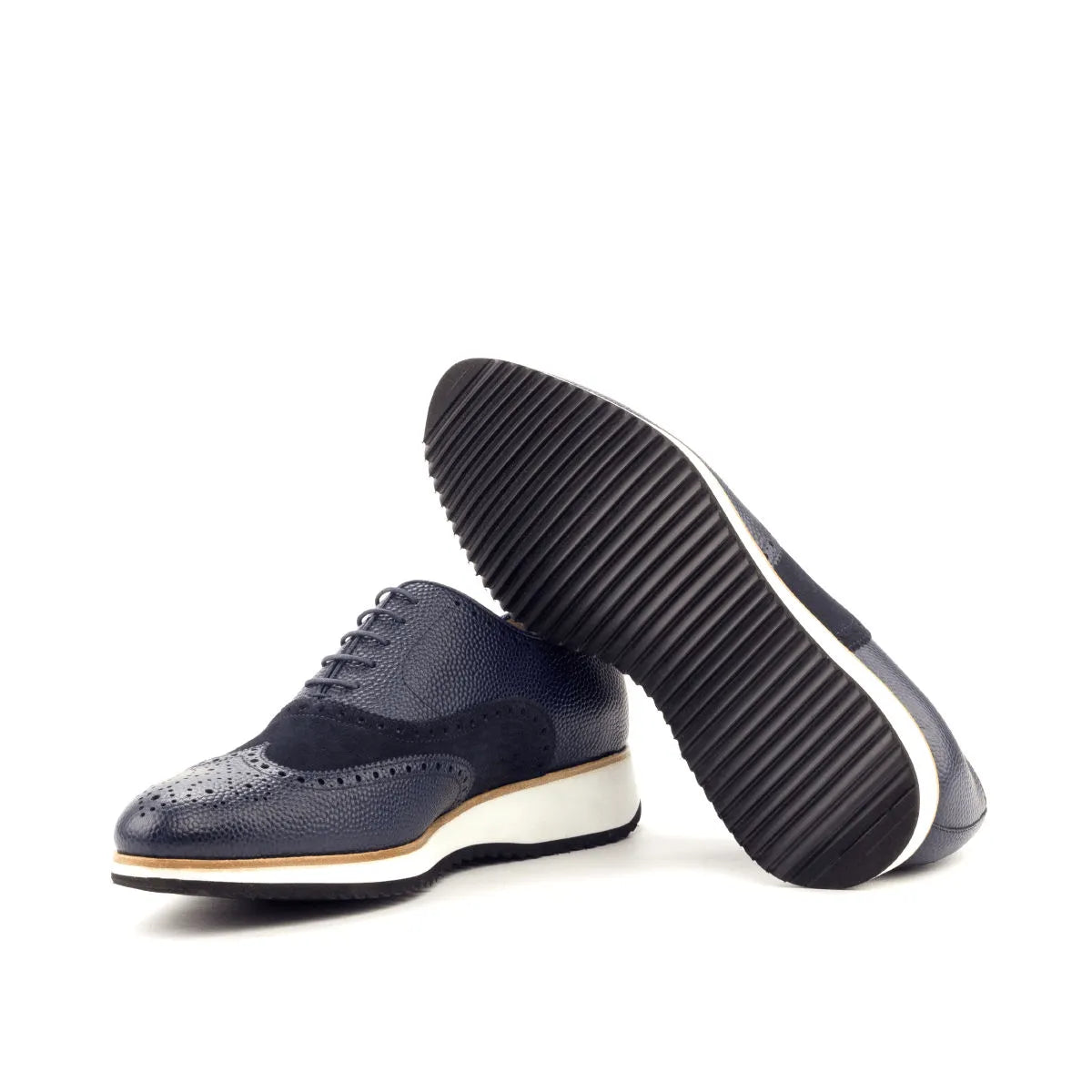 Blue leather and suede wingtip brogue shoes with white sole, available in cart